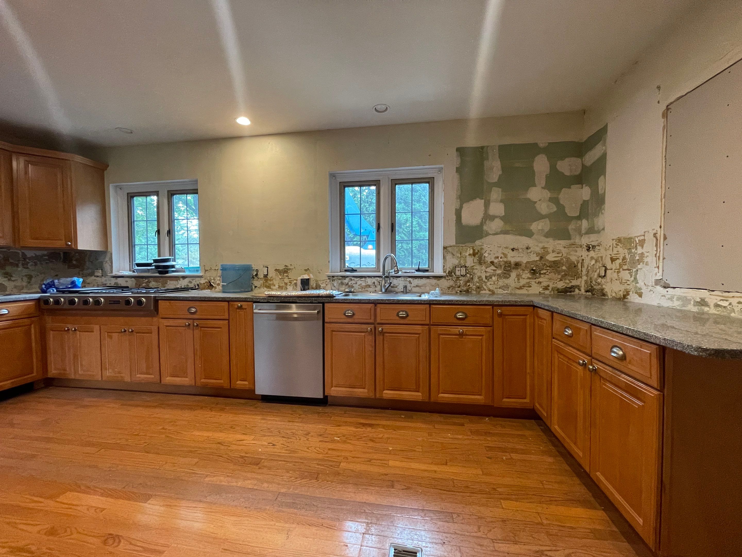 Kitchen Cabinet Painting using Milesi 2k by Trendy Walls Inc.