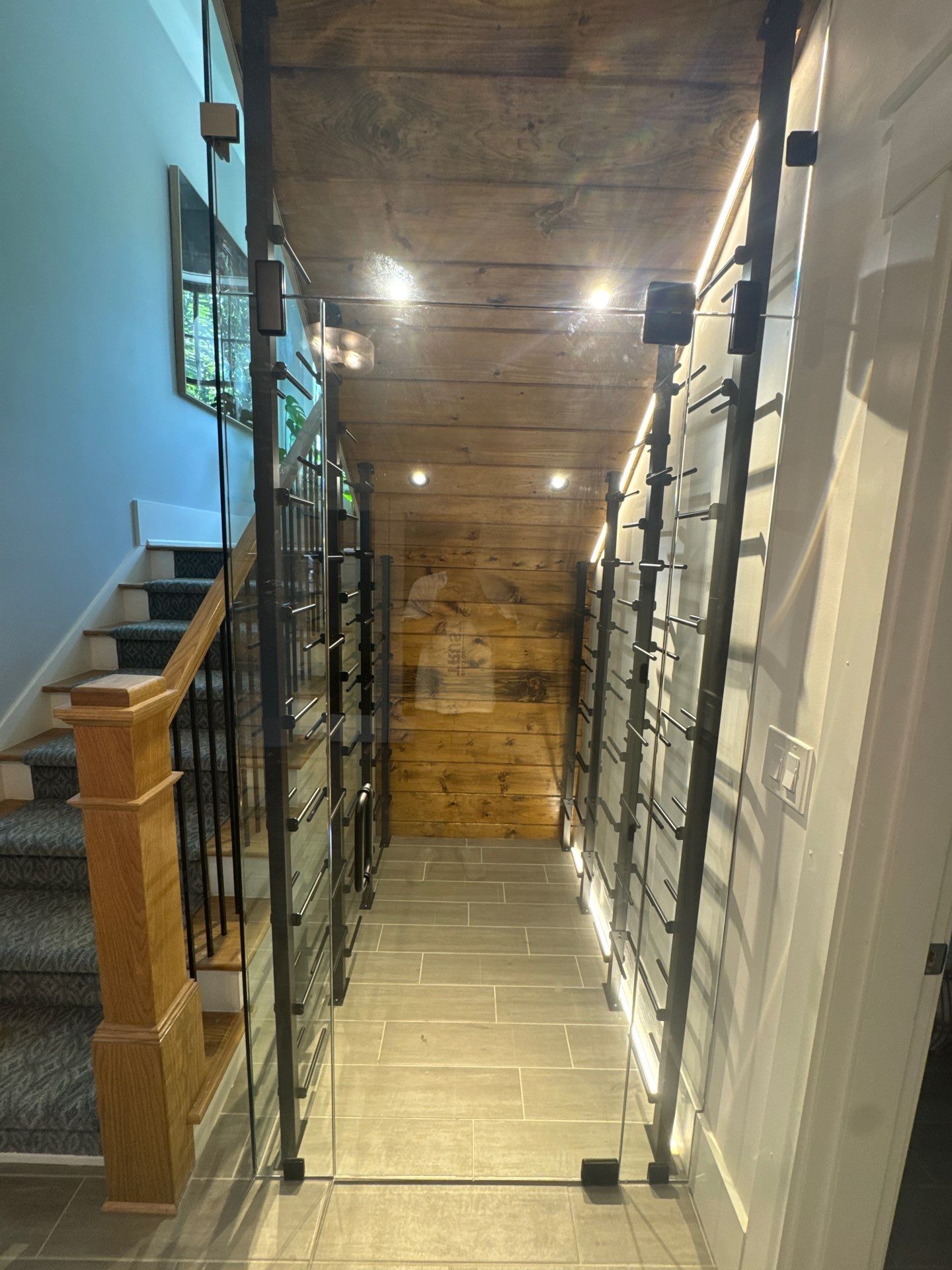 Modern Marietta Interior Renovation with Custom Built-ins and Wine Cellar by Swift Home Renovations