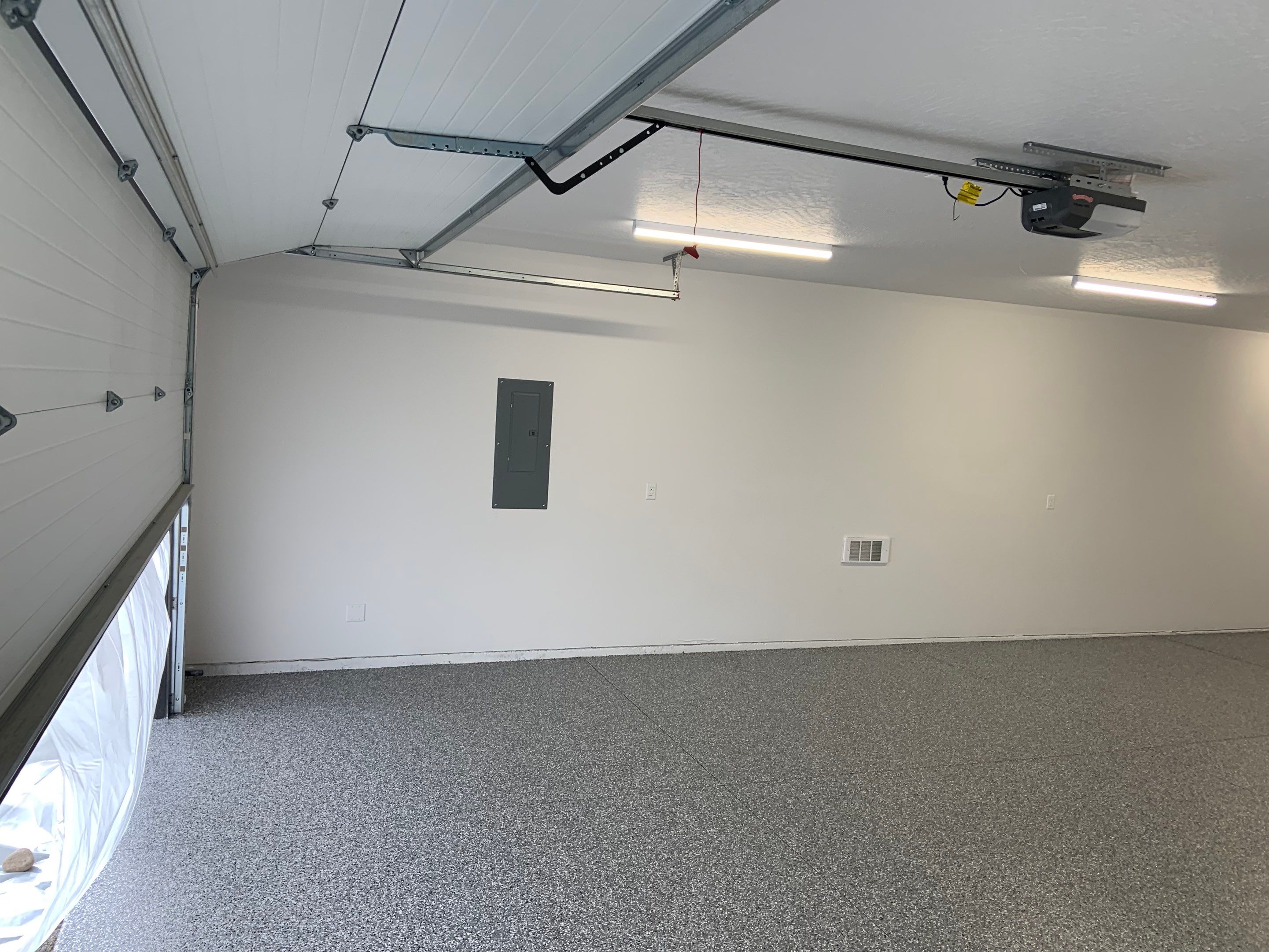 Garage Transformation using Smoke by Croc Coatings, LLC