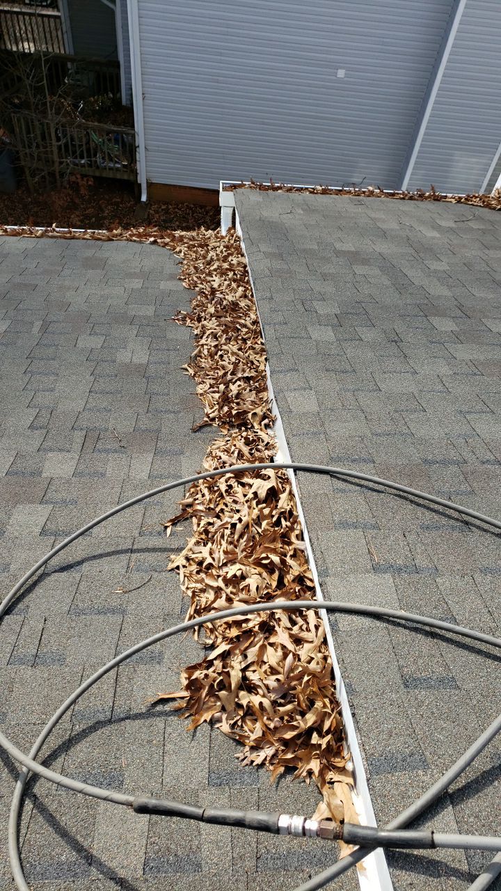Gutter Cleaning using water by Power Wash Masters LLC
