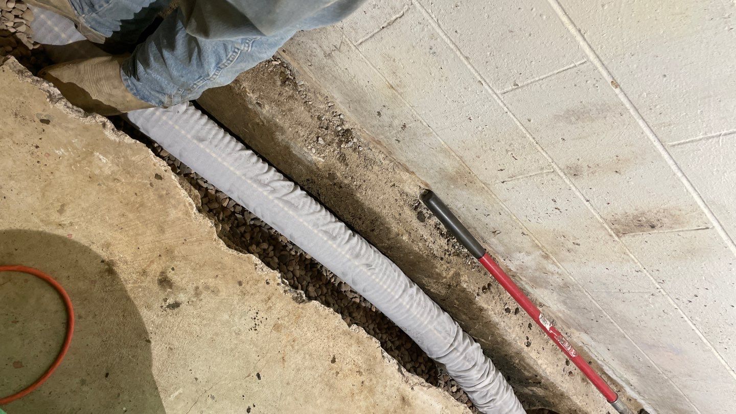 Drain tile & a sump pump for Ruth by Waterproofing Northeast