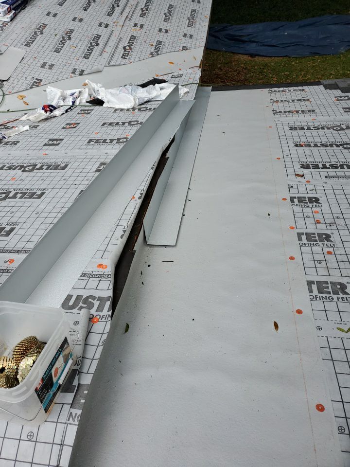 Residential Roofing Installation using Roof Replacement by American Roofing & Construction LLC