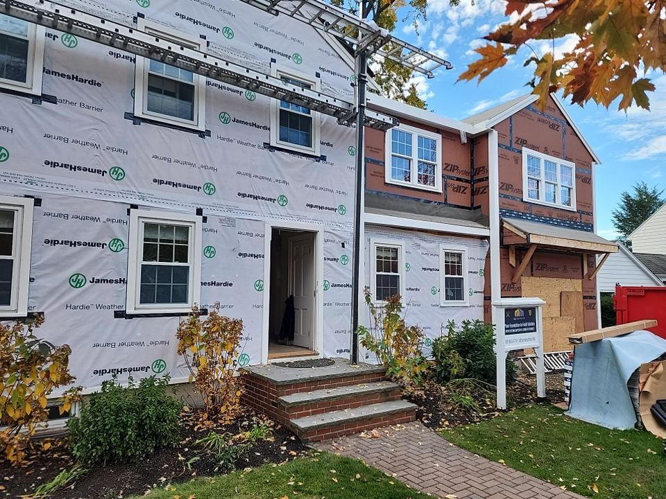 Siding and Roof for house with new addition in Milton, MA by UBrothers Construction