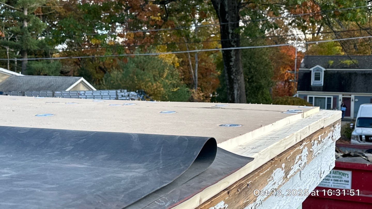 Westford EPDM Flat Roof with Gutter & Soffit/Fascia Replacement by Mighty Dog Roofing of Greater Middlesex County