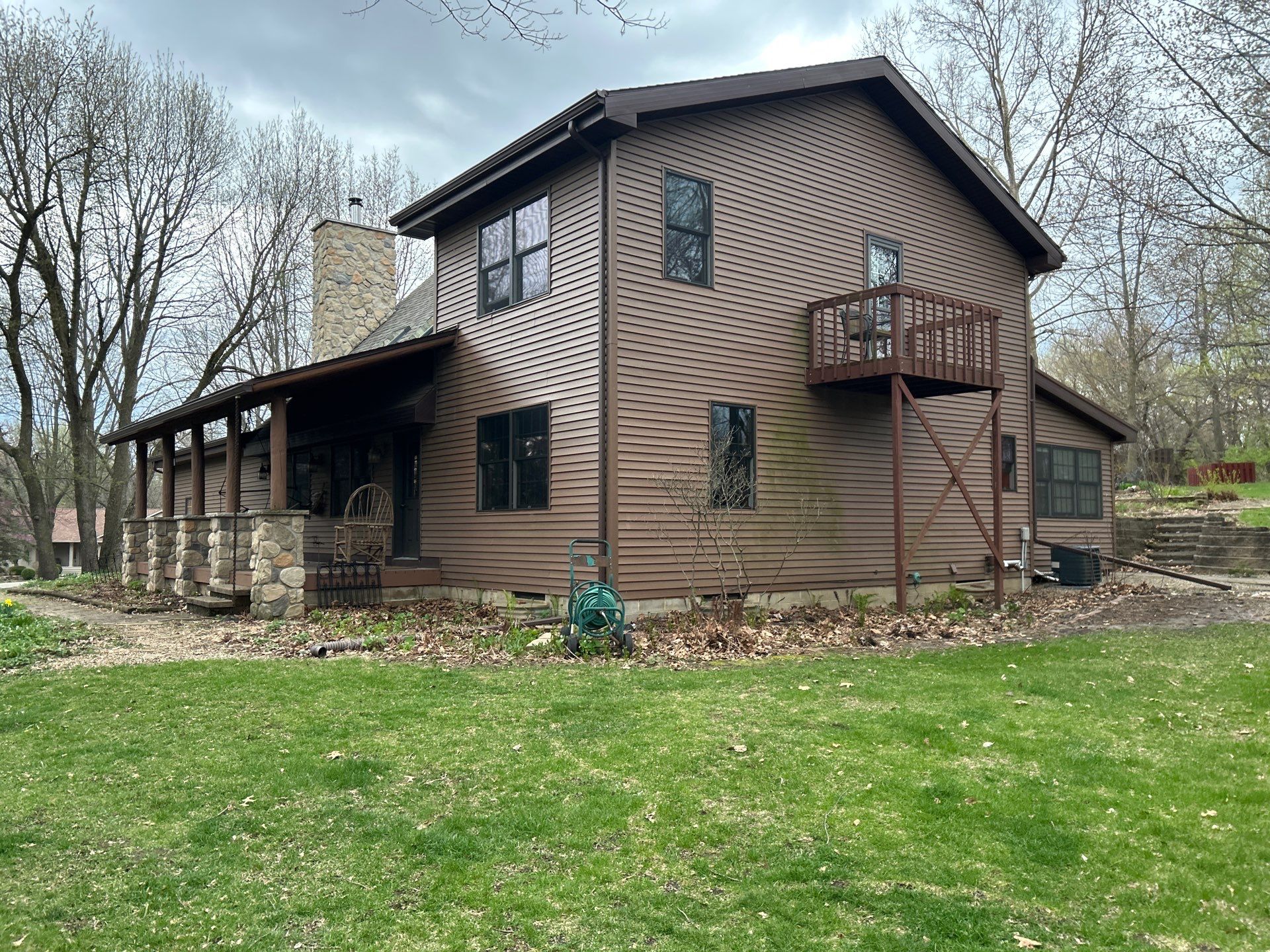 Pella Window installation using Pella Lifestyle wood/Aluminum window by United Windows and Siding LLC