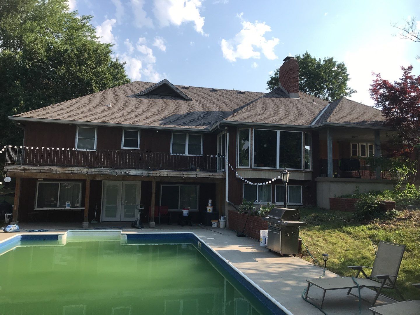 New white siding with Black trim by EEC  Windows, Siding & Roofing 
