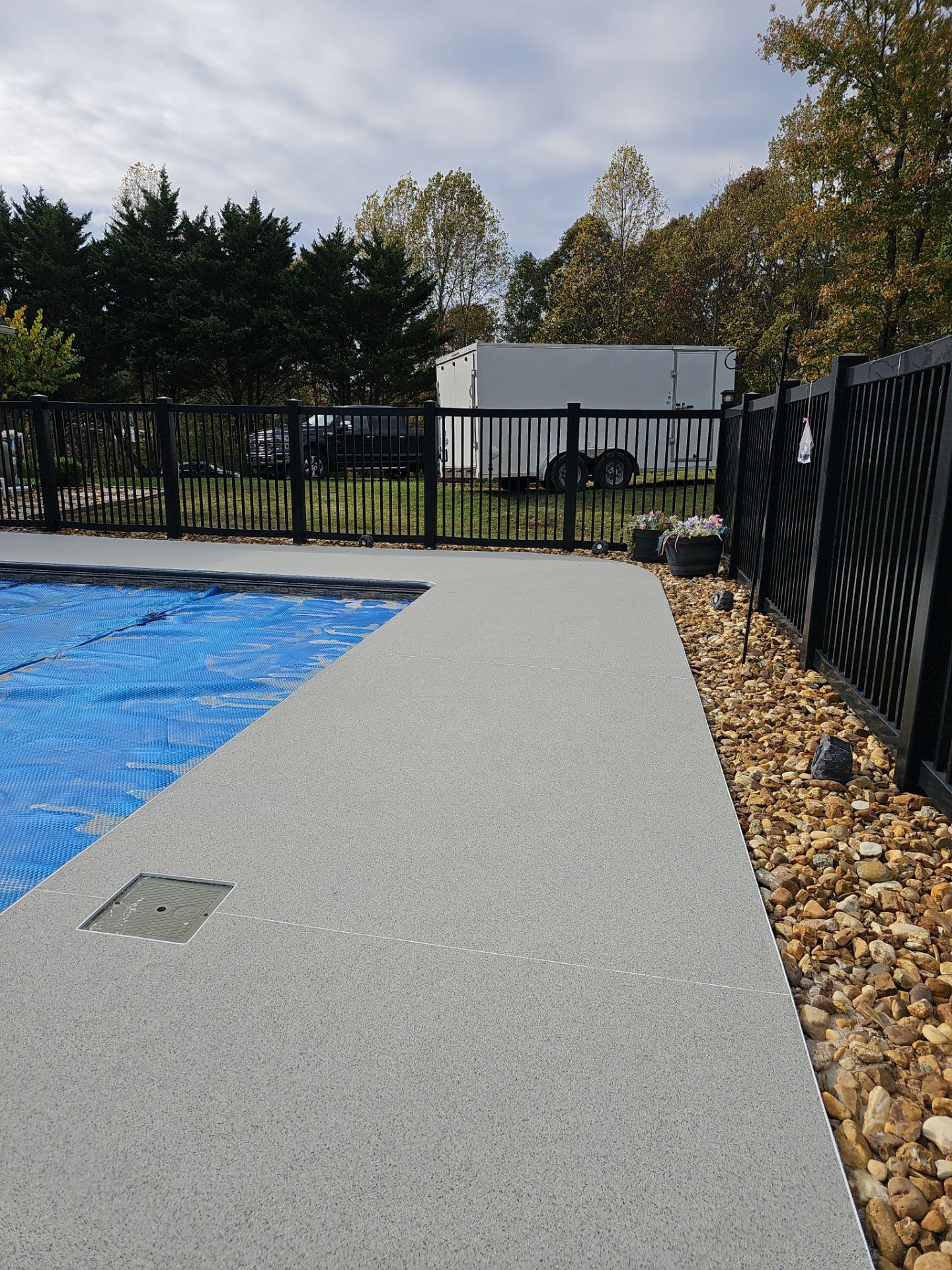 Pool Deck & Sidewalk using Quicksand & Obsidian by Elite Floor Solutions