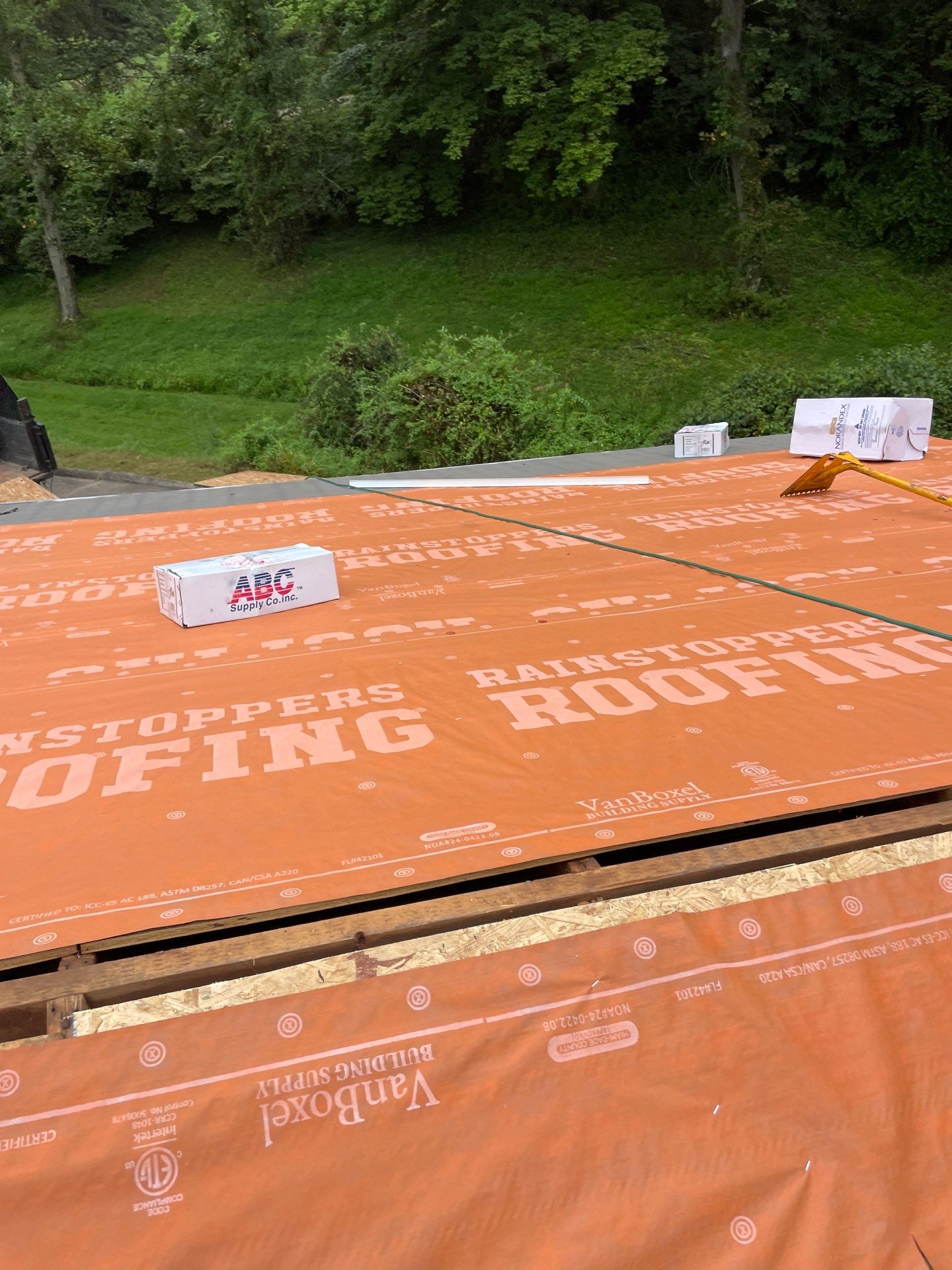 Residential Roofing Installation using GAF Timberline HDZ Charcoal by Rainstoppers Roofing