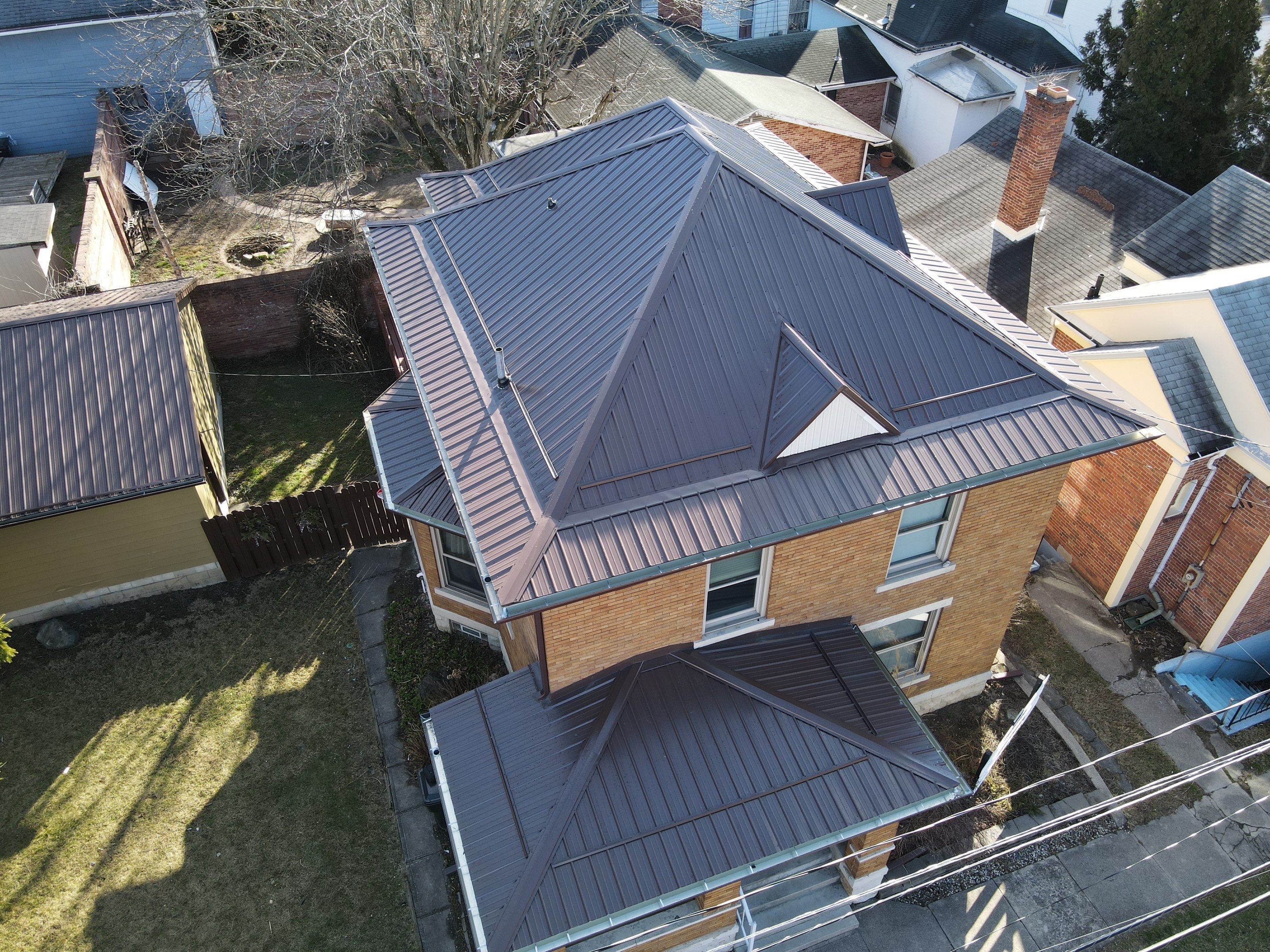 Residential Roofing Installation using Performance Panel Metal - Brown by RoofX
