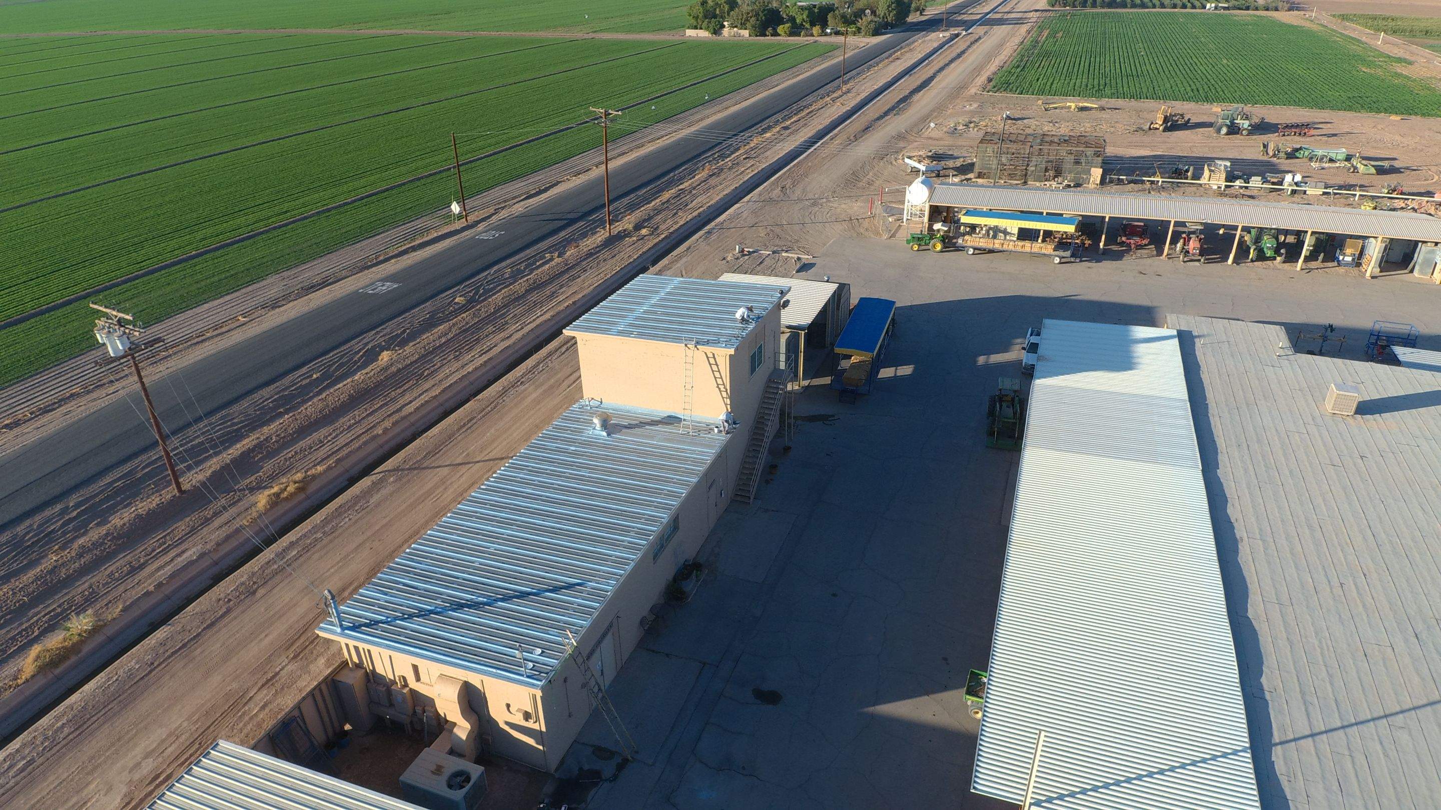 Metal roof restoration on commercial roof using Conklin Benchmark/PUMA XL fabric and coating by Straight Edge Roofing Inc
