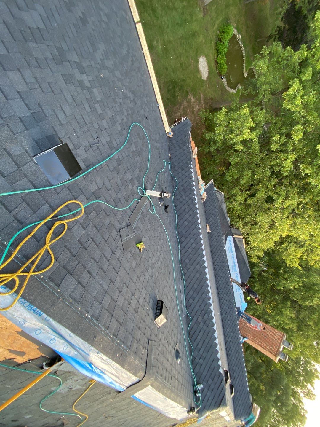 Roof Replacement using CertainTeed Landmark Moire Black by 180 Contractors