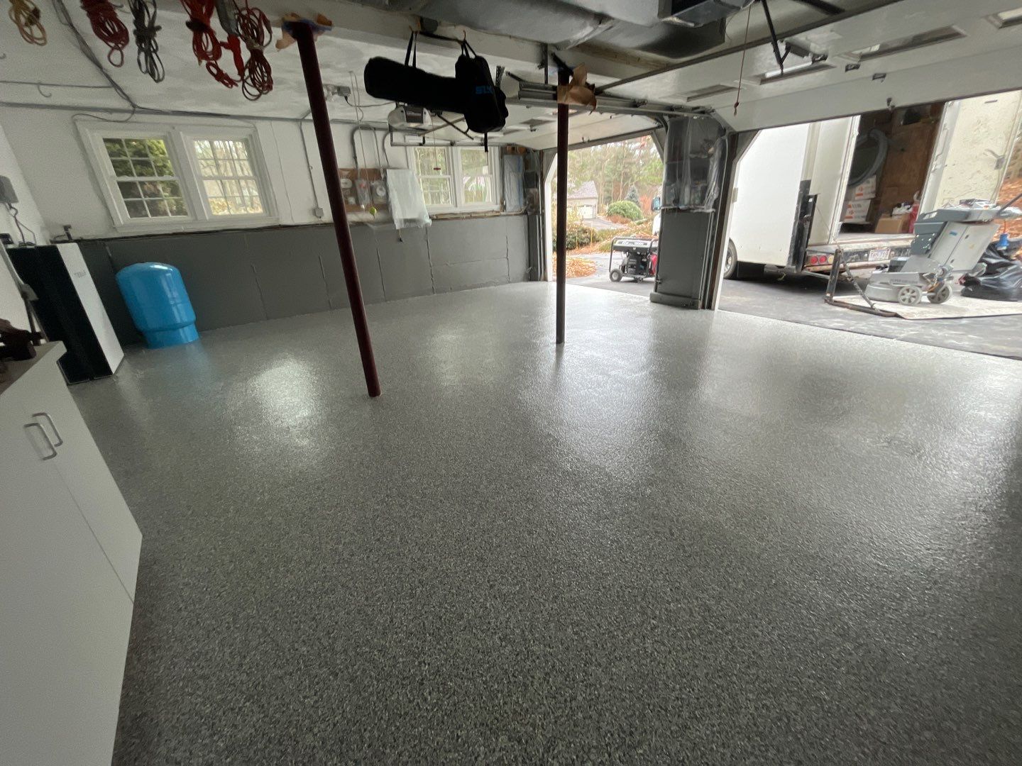 Maestranzi Garage TransFLOORmation by Symphony Concrete Coatings