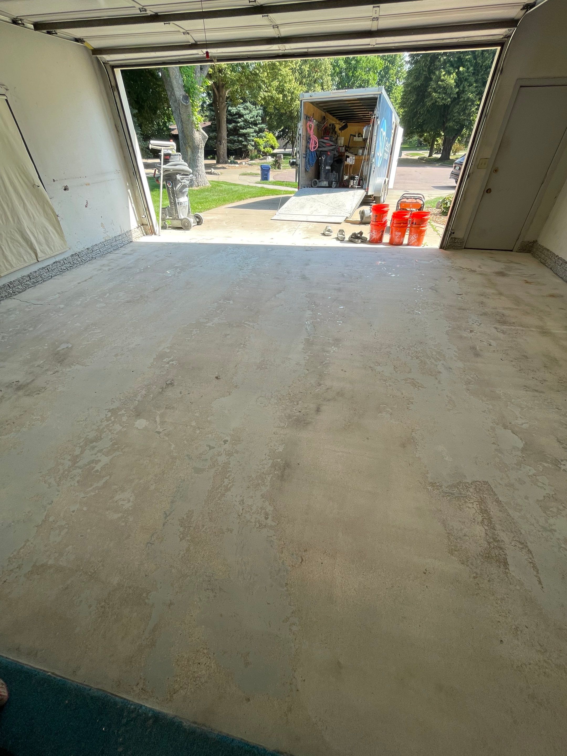 Custom Creekbed Garage Floor Coating in Sioux Falls by Select Painting, Coatings & Garage Cabinets