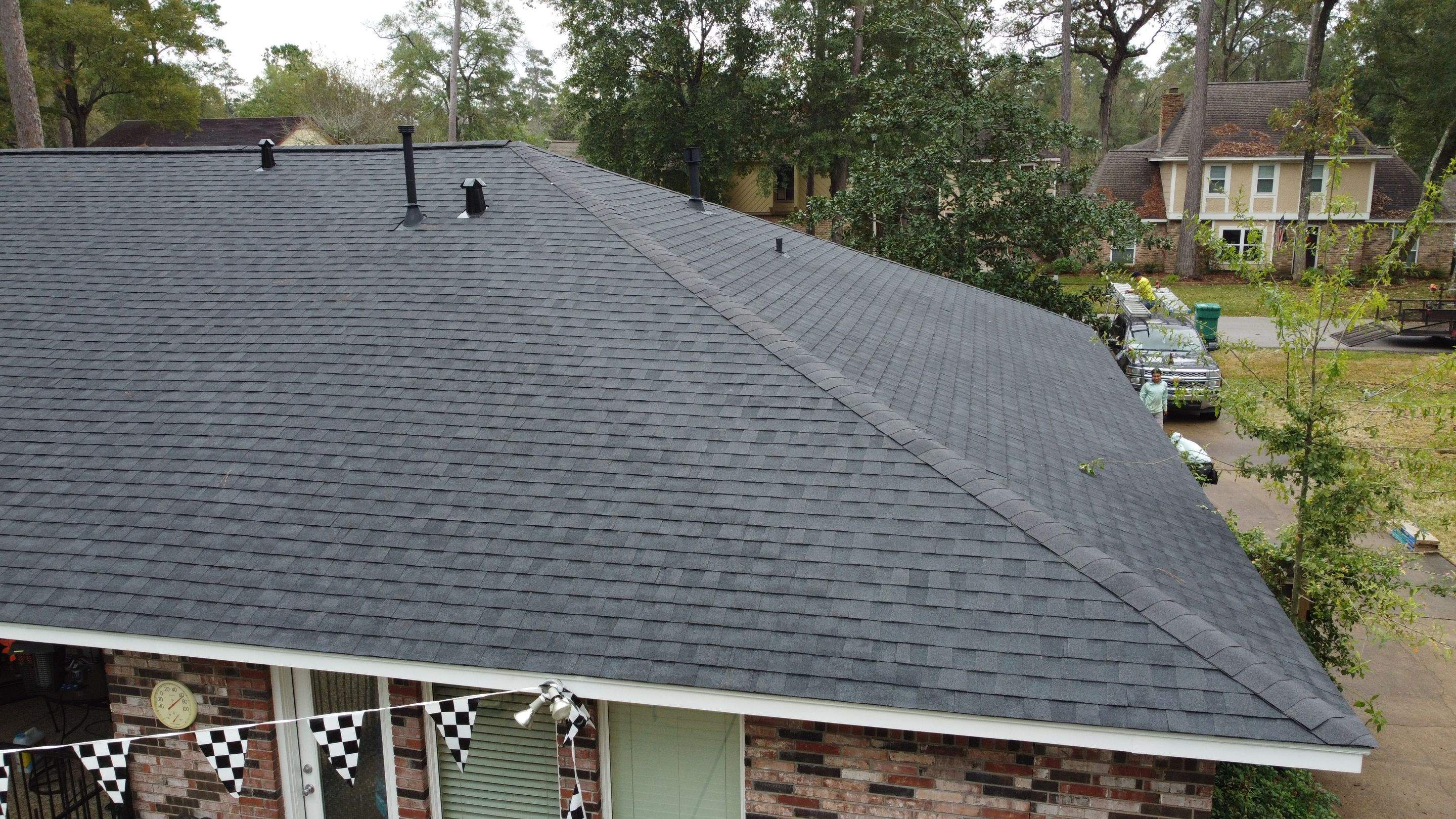 Residential Roofing Installation using Certainteed Landmark Moire Black by Galvan Roofing and Construction