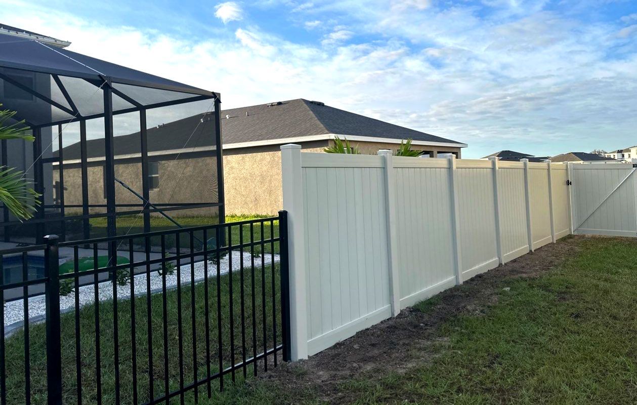 Vinyl Fence Installation using Vinyl Fence and a Black 3 Rail Aluminum Fence by Asap fence and gates, LLC