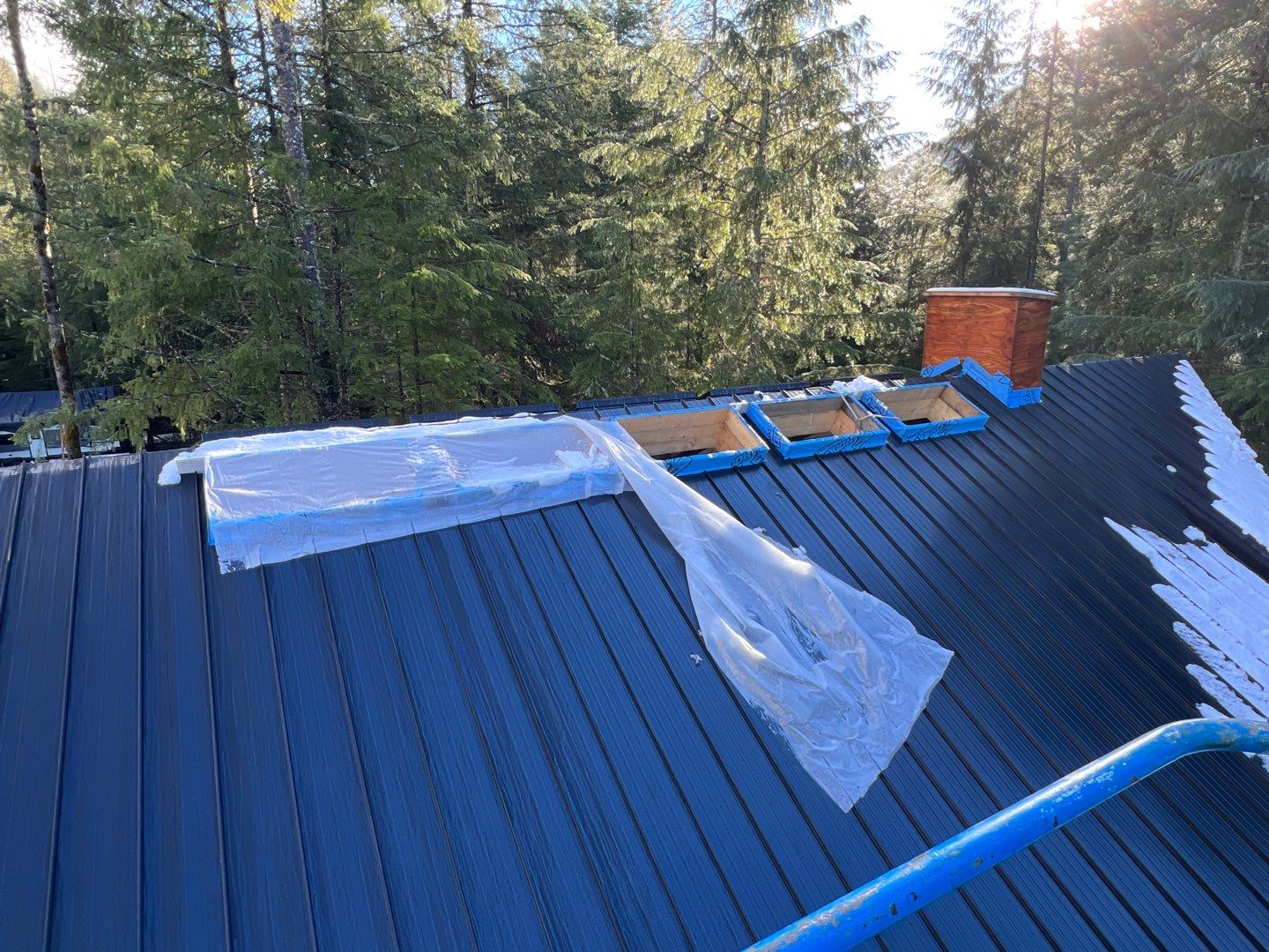 Residential Roofing Installation using 12" Prolok metal  by Top Notch Roofing Inc