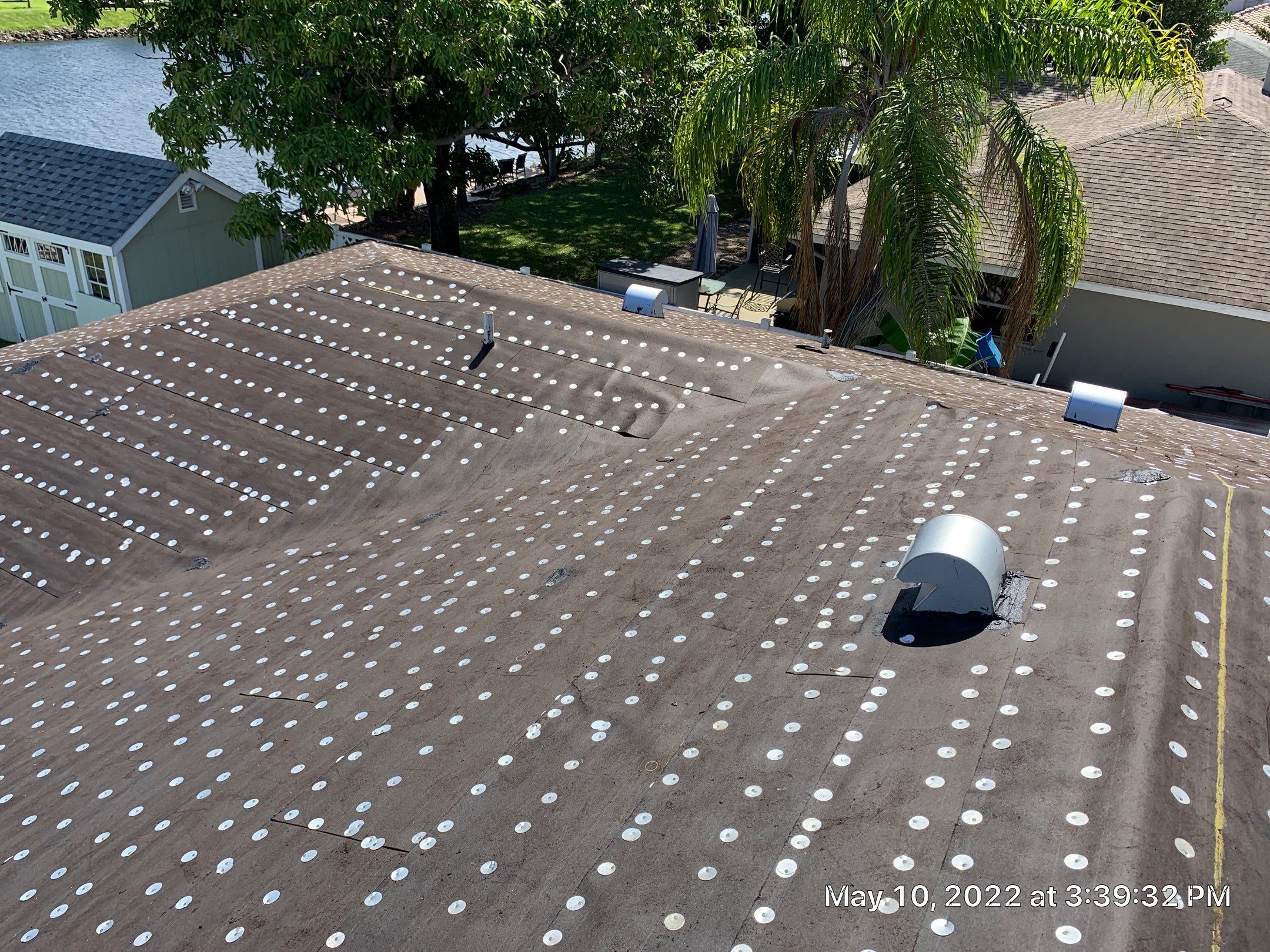 Residential Roofing Installation using 1" Nail strip metal roof by BLUES BROTHERS ROOFING