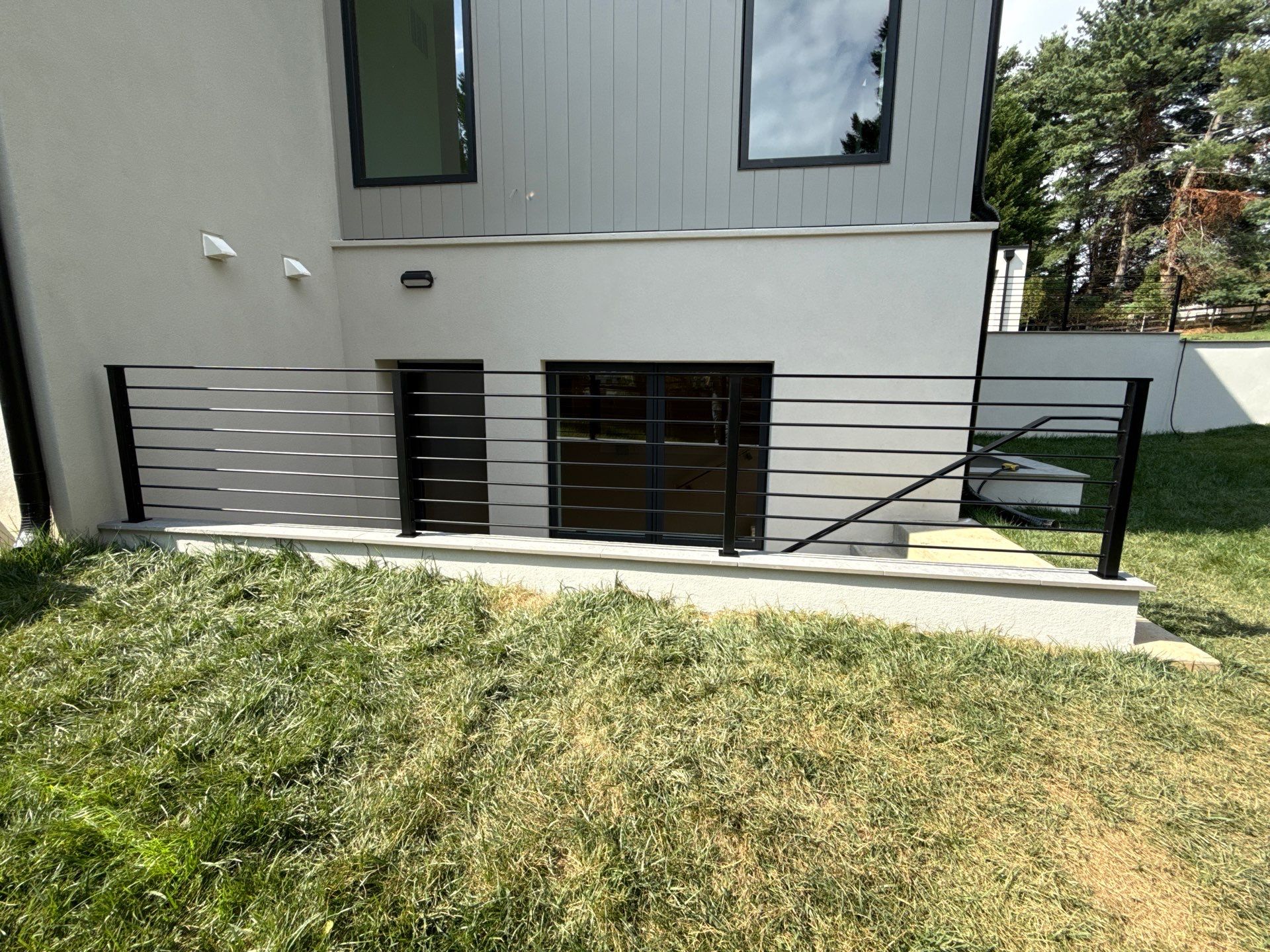 Modern Custom Horizontal Round Bar Railings – Contemporary Residential Design by Capitol Iron Works