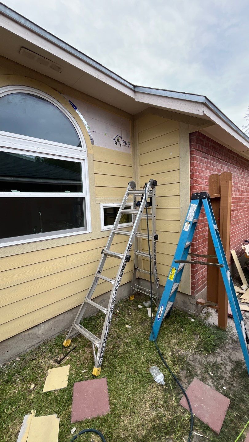 Windows with a side of Siding  by Bayfront Roofing and Construction