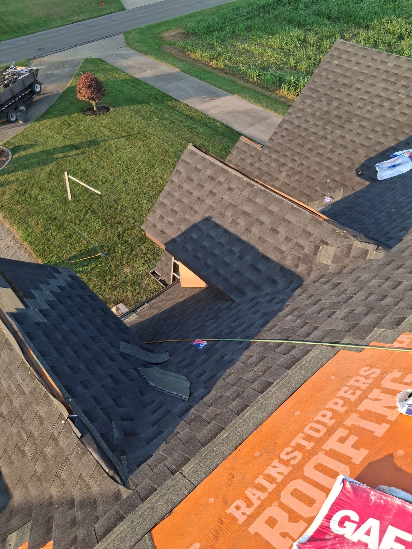 Residential Roofing Installation using GAF Timberline HDZ Charcoal by Rainstoppers Roofing