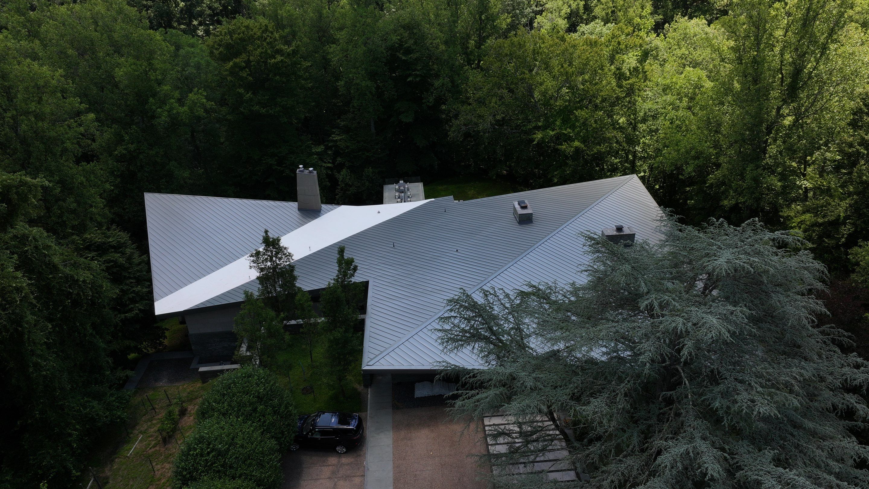 Modern Standing Seam Metal Roof Installation in McLean by American Home Contractors