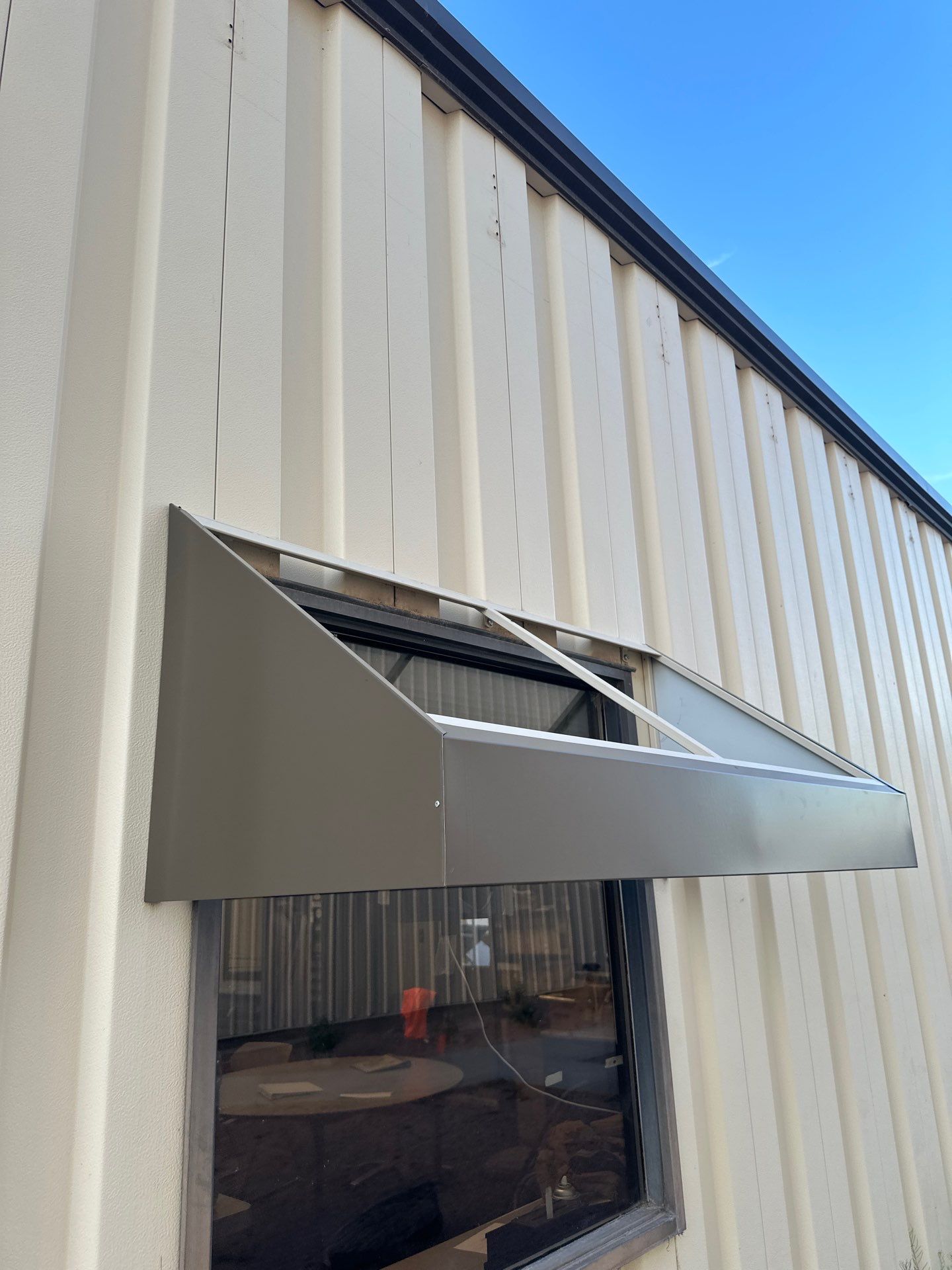 Saddle Tan Standing Seam by Reimagine Roofing