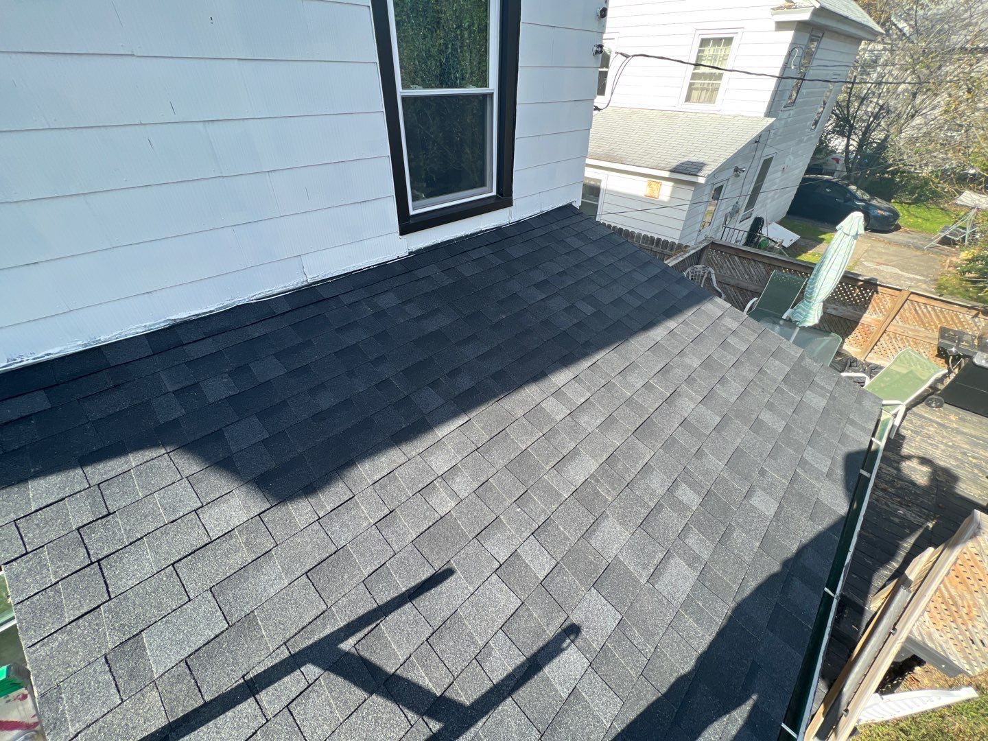 Onyx Black Shingles by Reimagine Roofing