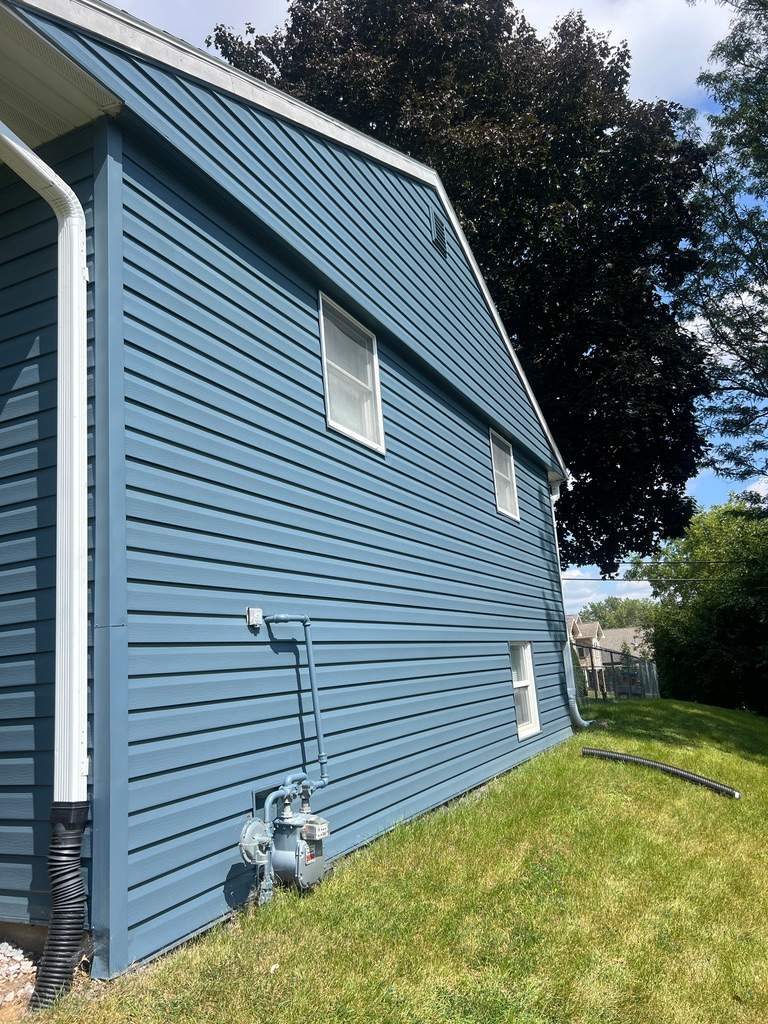 Fading & Oxidized siding turned new again! by Grandview Painting