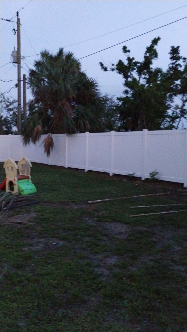 White Vinyl Privacy Fence Installation In North Port, FL by Asap fence and gates, LLC