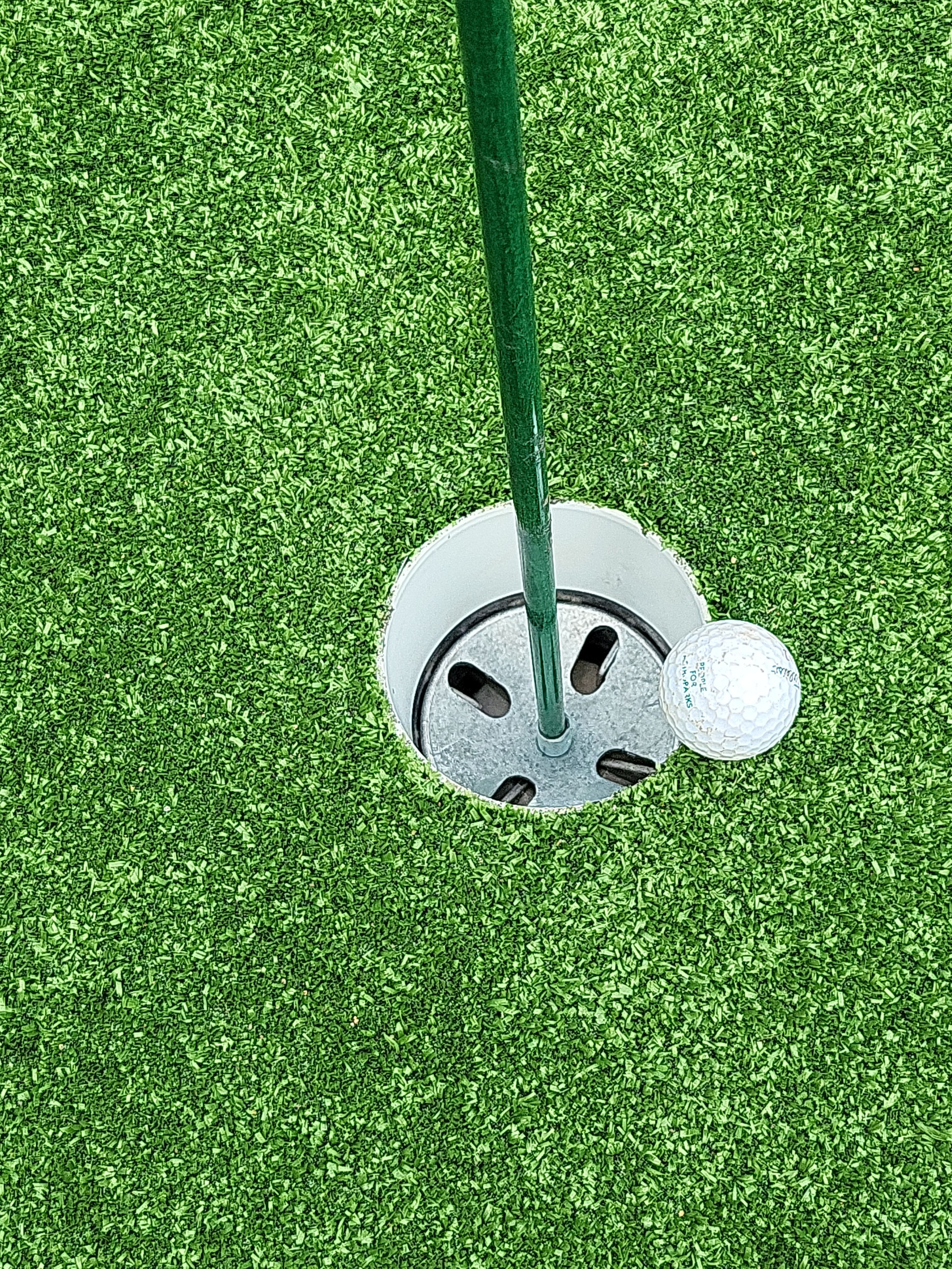 Custom Synthetic Putting Green Installation for Aspiring Collegiate Golfer in Worthington, Ohio by Southwest Greens Midwest