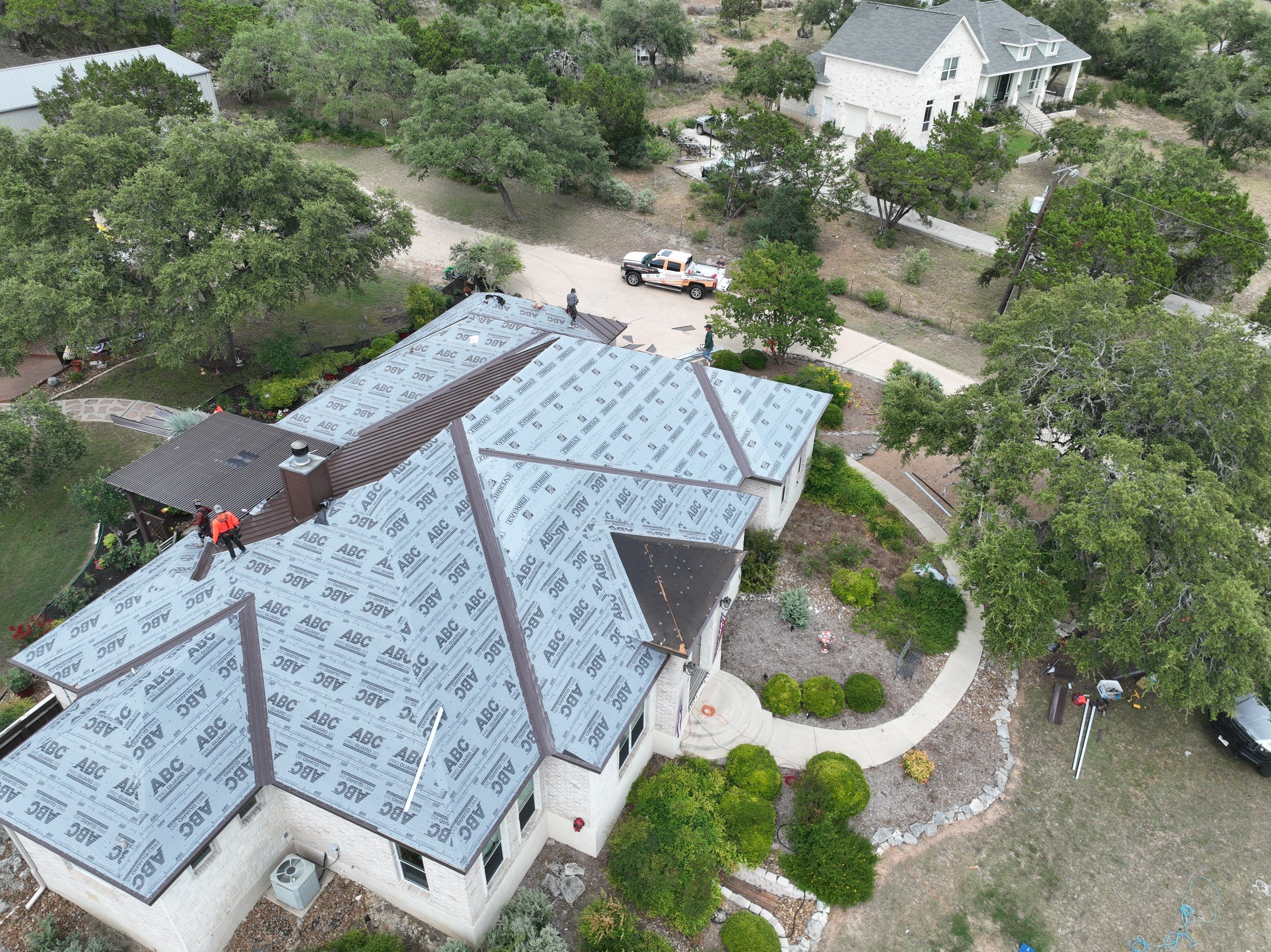 Residential Metal Roof Installation using McElroy Metal by Premier Roofing and Contracting