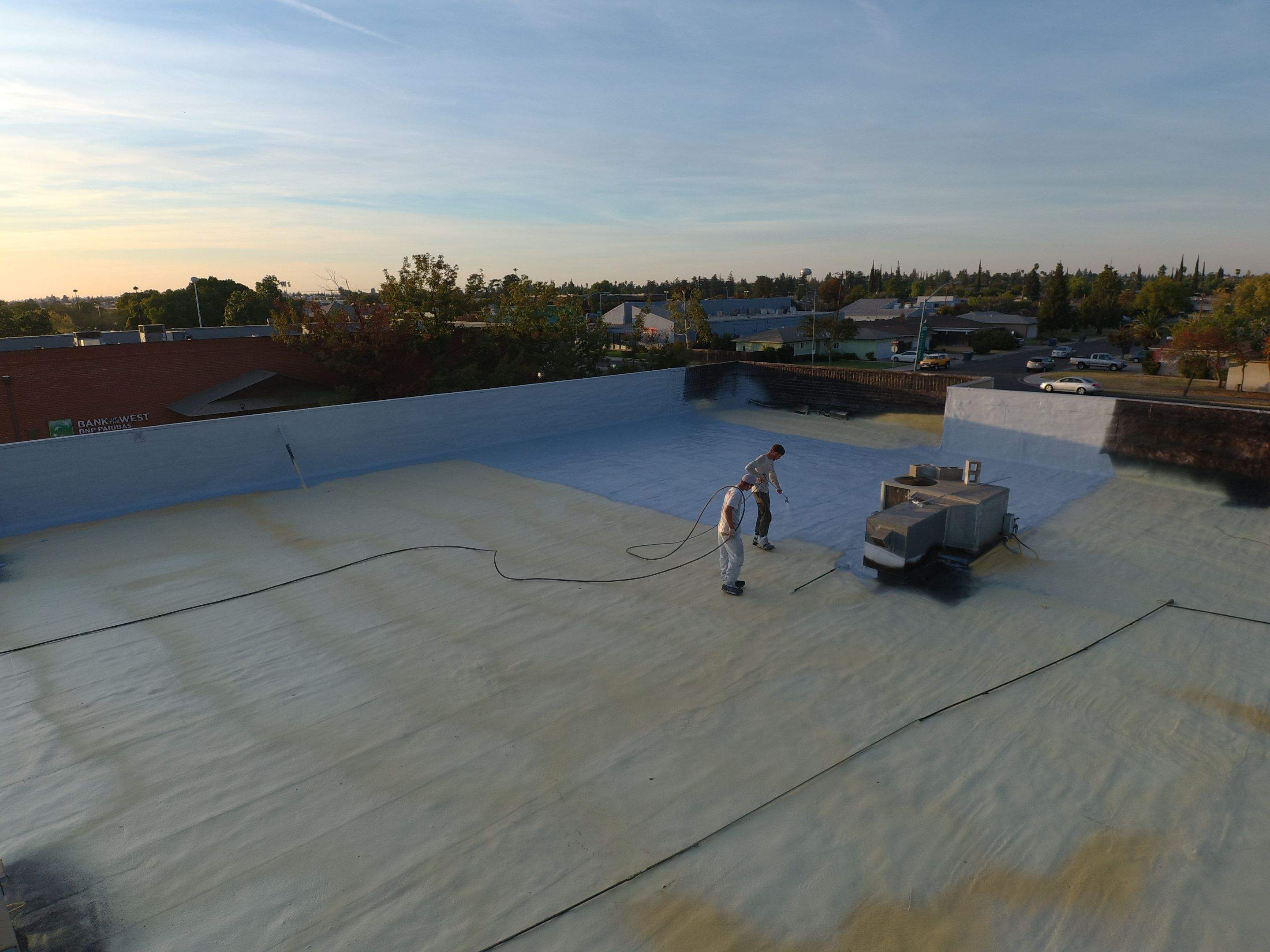 Reburbish existing spray foam job by Straight Edge Roofing Inc