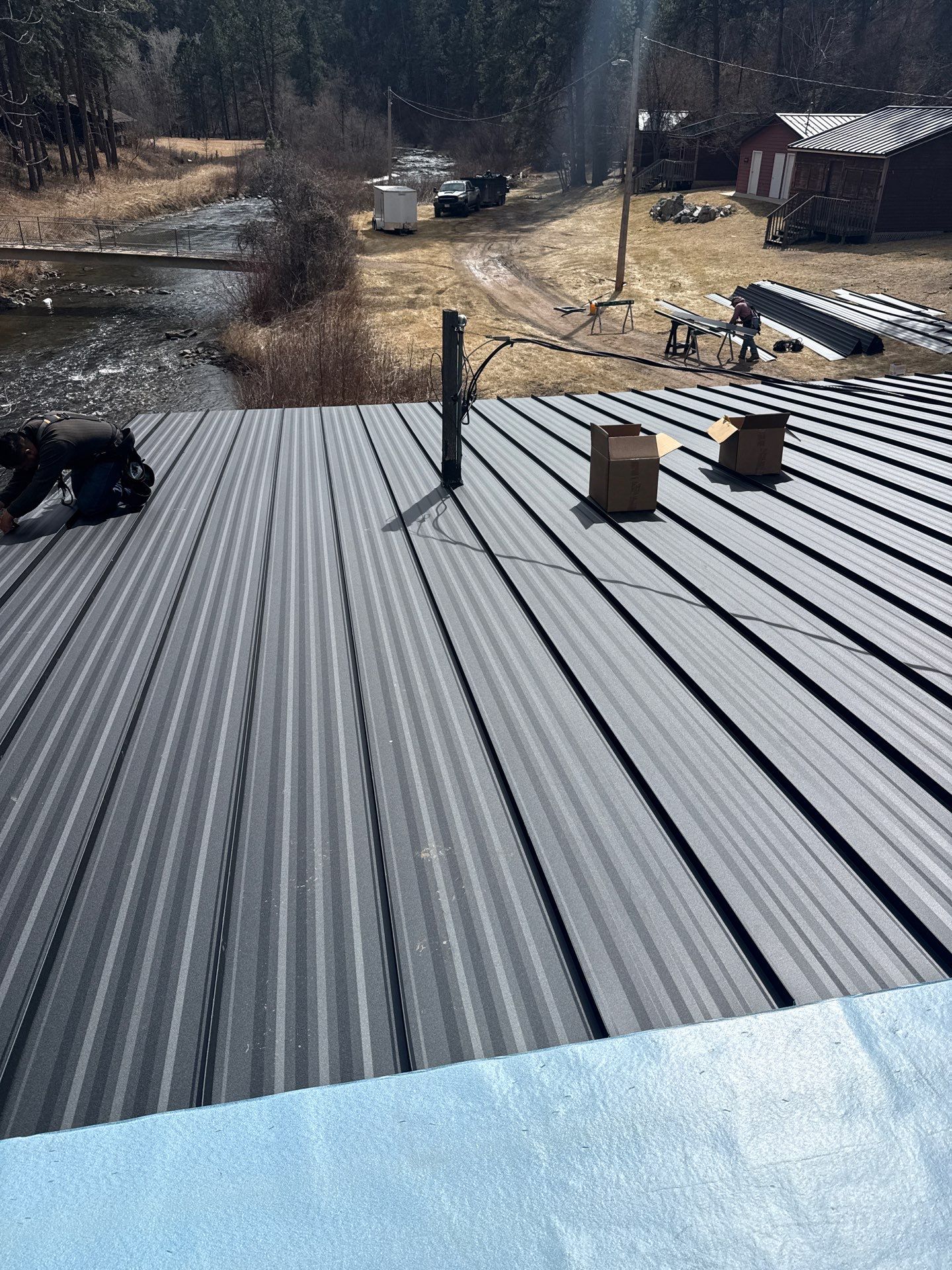 Residential Roofing Installation using Steel Roofing by Weather-Tite Exteriors LLC