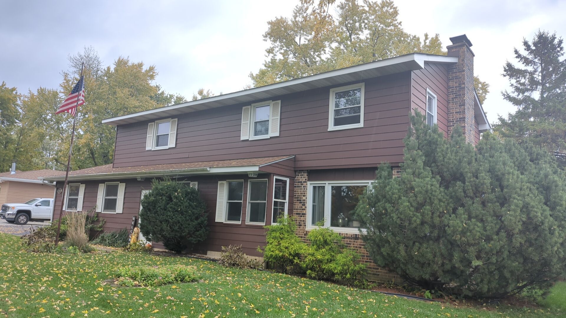 Vinyl siding replacement using CertainTeed Monogram double 5" vinyl siding  by AJ Exteriors & Roofing Inc.
