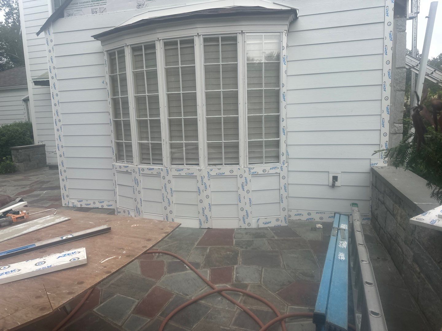 Siding Installation using Hardie Plank Artic white by A Plus Exterior