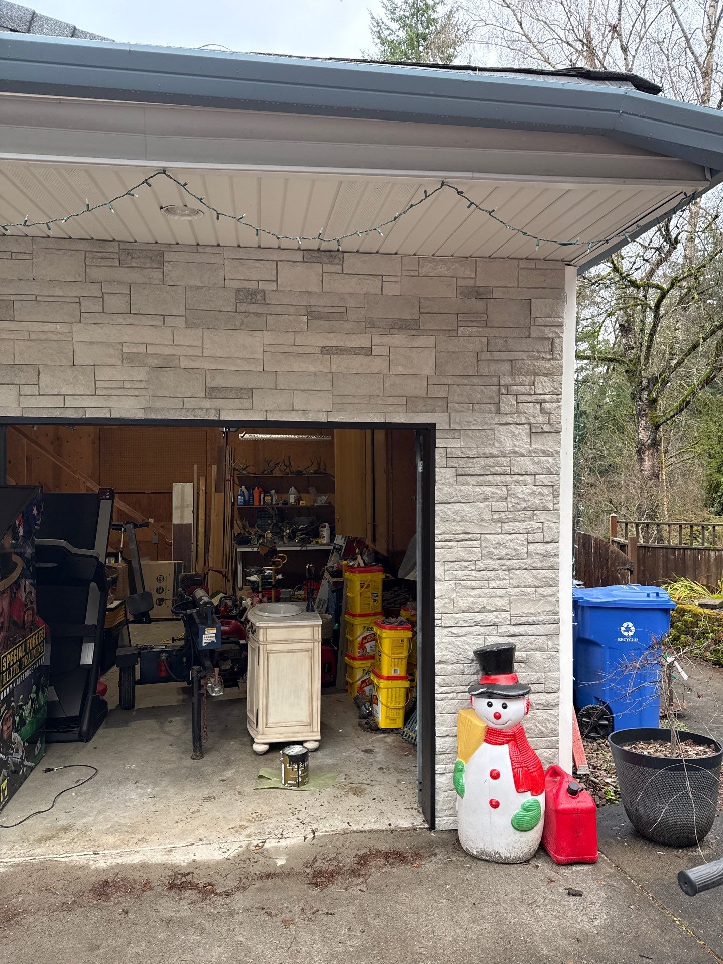 Damascus Garage Exterior Repair and Stacked Stone Veneer Installation by American Made Construction 