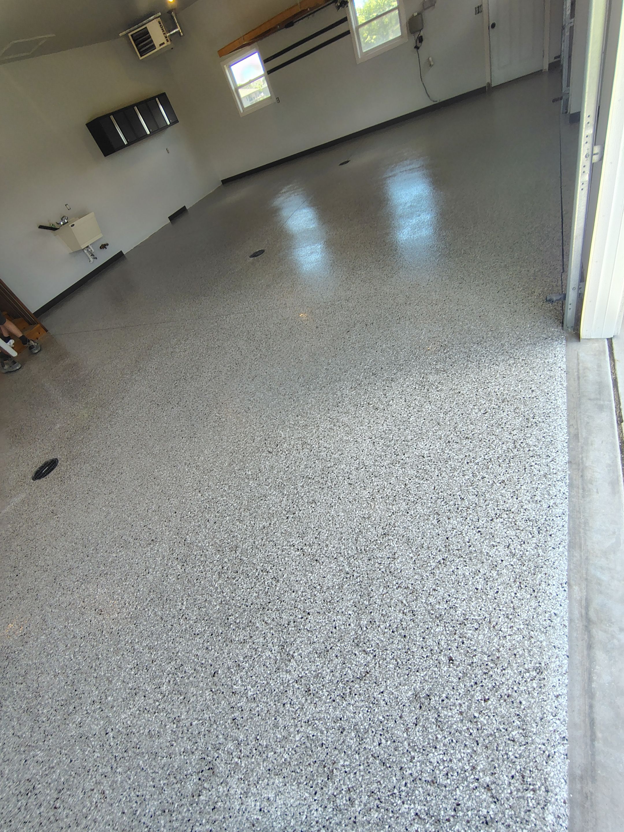 Multi-Car Garage Concrete Coating and Crack Repair in Dell Rapids by Select Painting, Coatings & Garage Cabinets