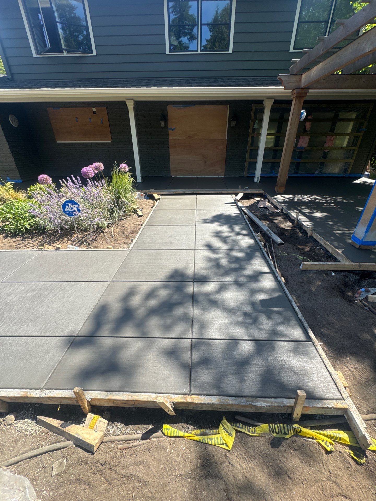 Concrete Driveway Makeover | Edmonds  by Jireh Asphalt & Concrete Inc 