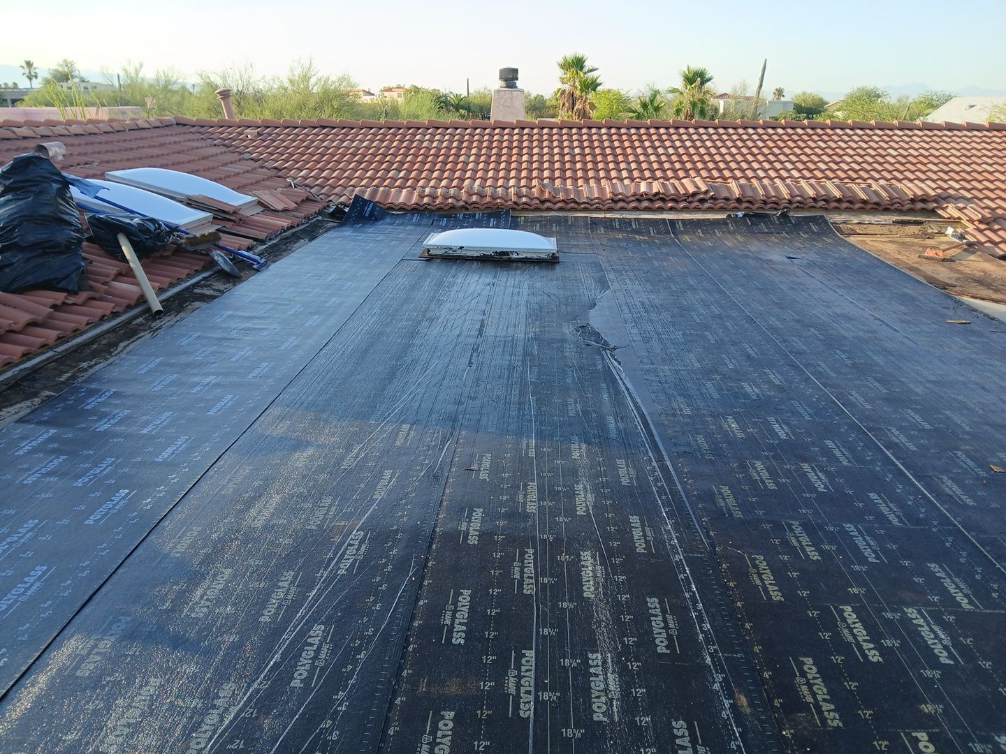 Residential Tile Roof Restoration and Low Slope Membrane Replacement in Tucson by West Coast Roofing AZ