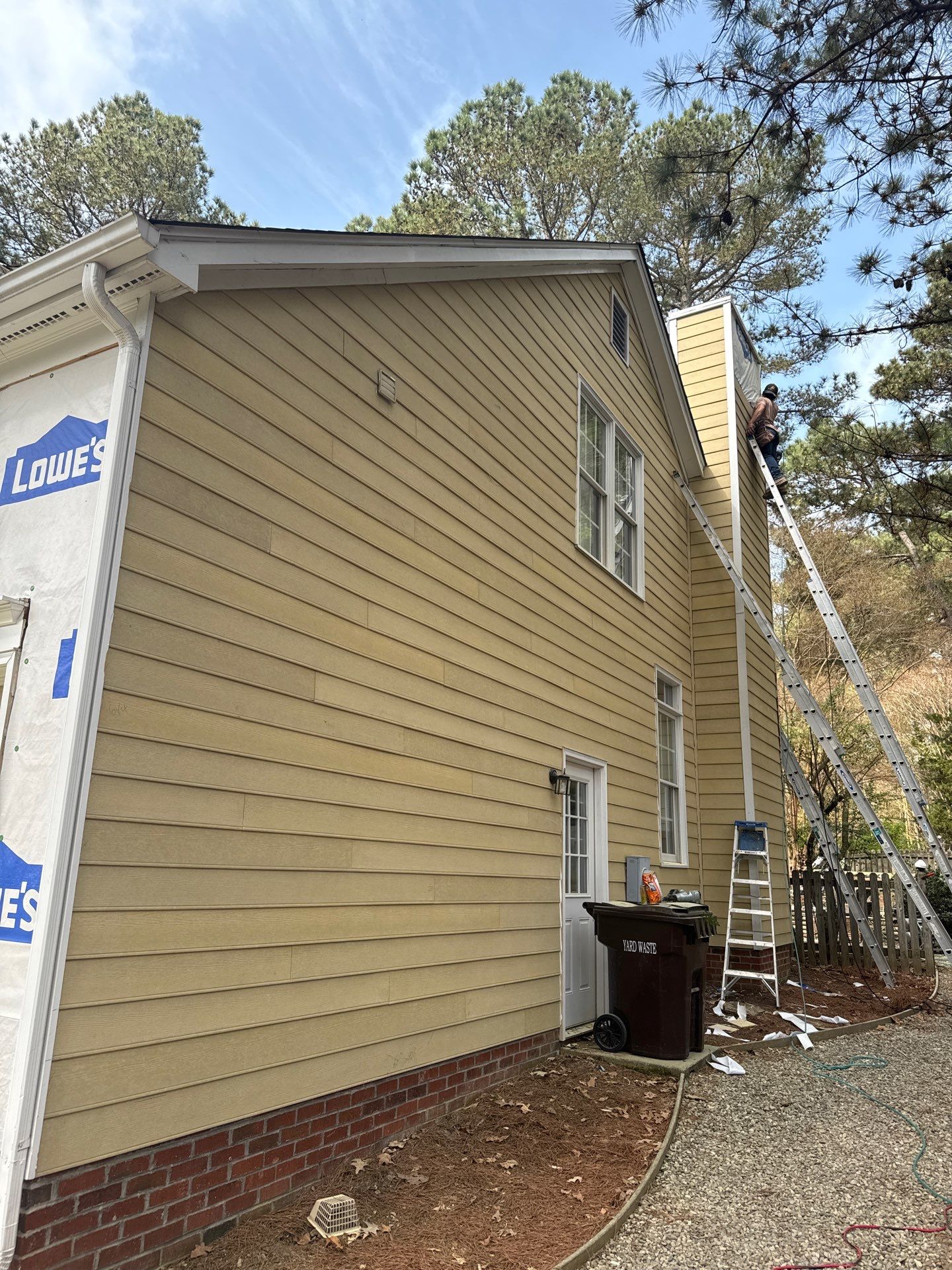 Exterior paint and siding replacement by GonzalezPainters & Contractors Inc 