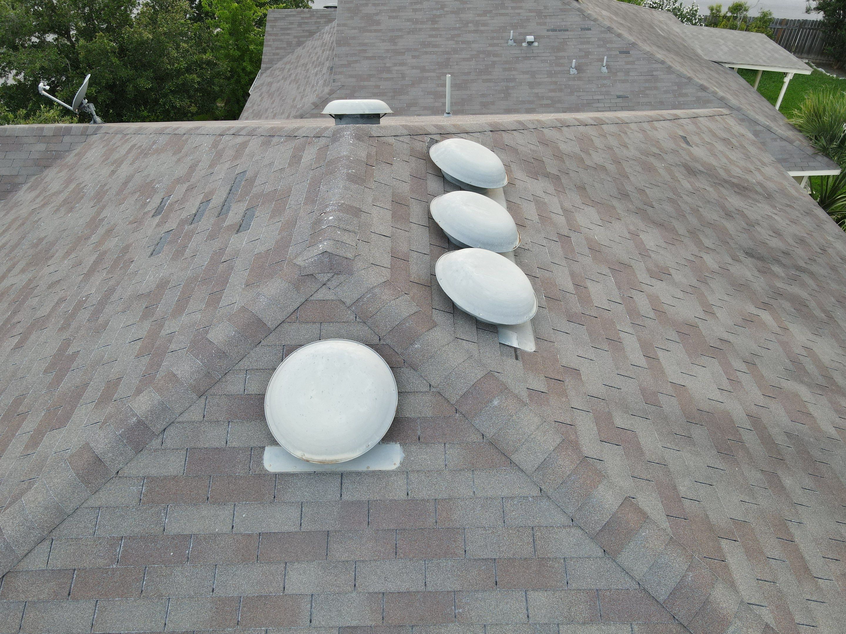 Residential Roofing Replacement and Gutter Installation in Manor by Caliber Restoration LLC