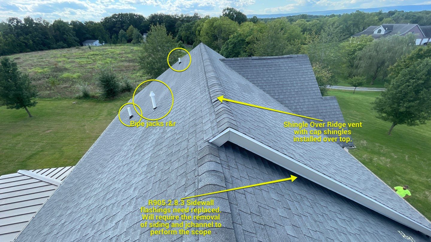 Roof Damage using Certainteed Lifetime Roofing System- Moire Black Landmark Pro shingkes with shadow ridge caps. by BulletpROOF Exteriors