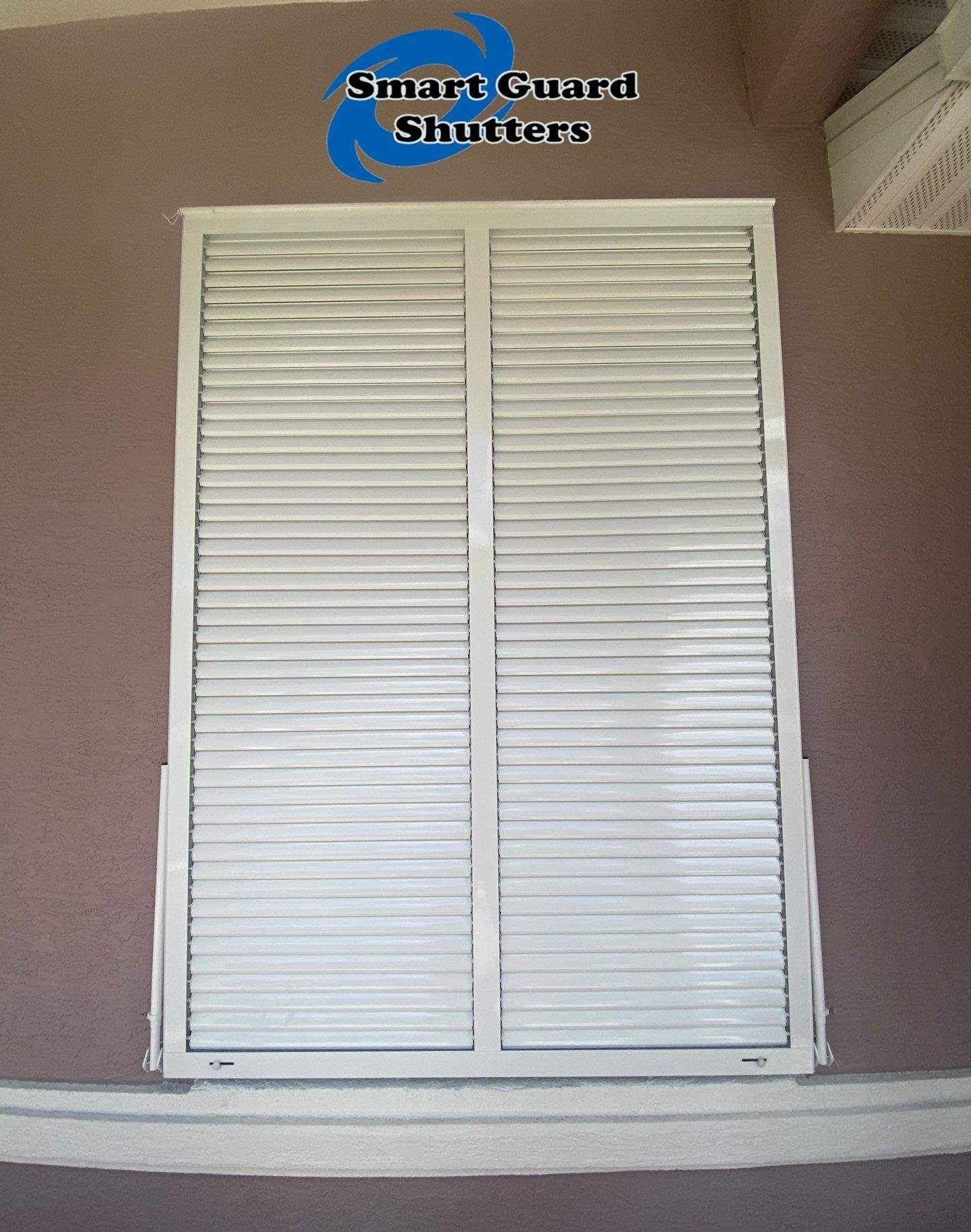 Impact Bahama Shutters in Signal White by Smart Guard Shutters