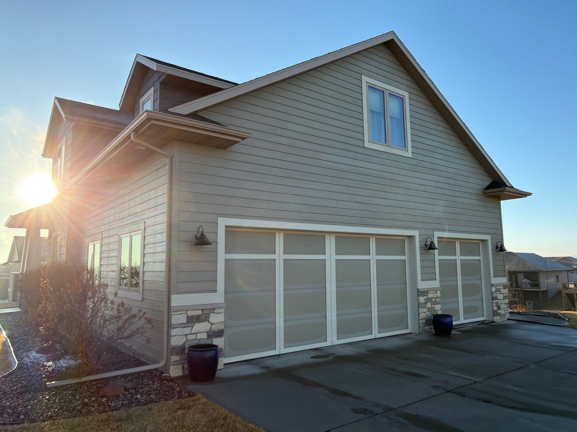 Residential Exterior Painting and Color Update in Sioux Falls by Select Painting, Coatings & Garage Cabinets
