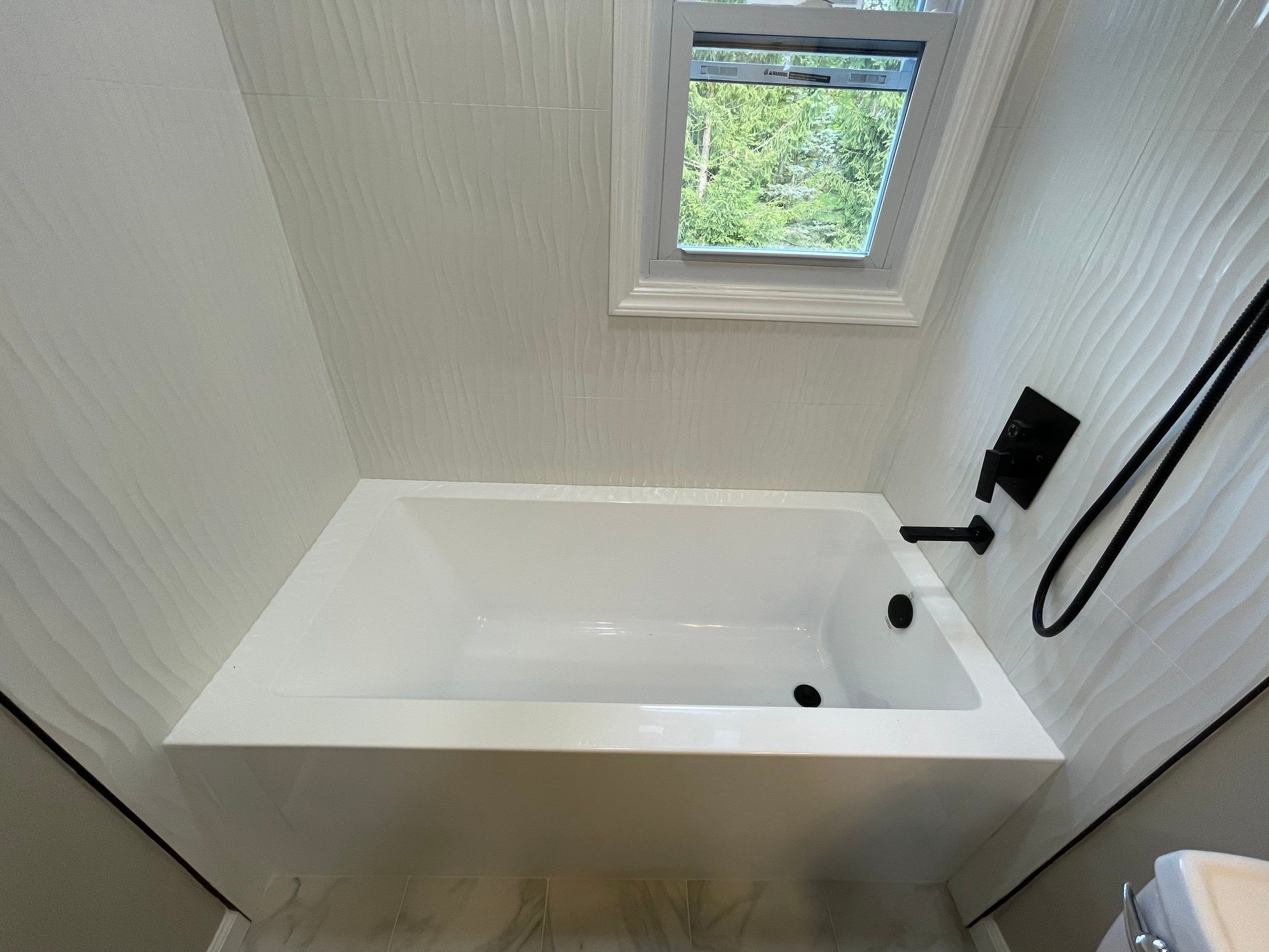 Bathroom Remodel using Tile by Home Concepts Construction