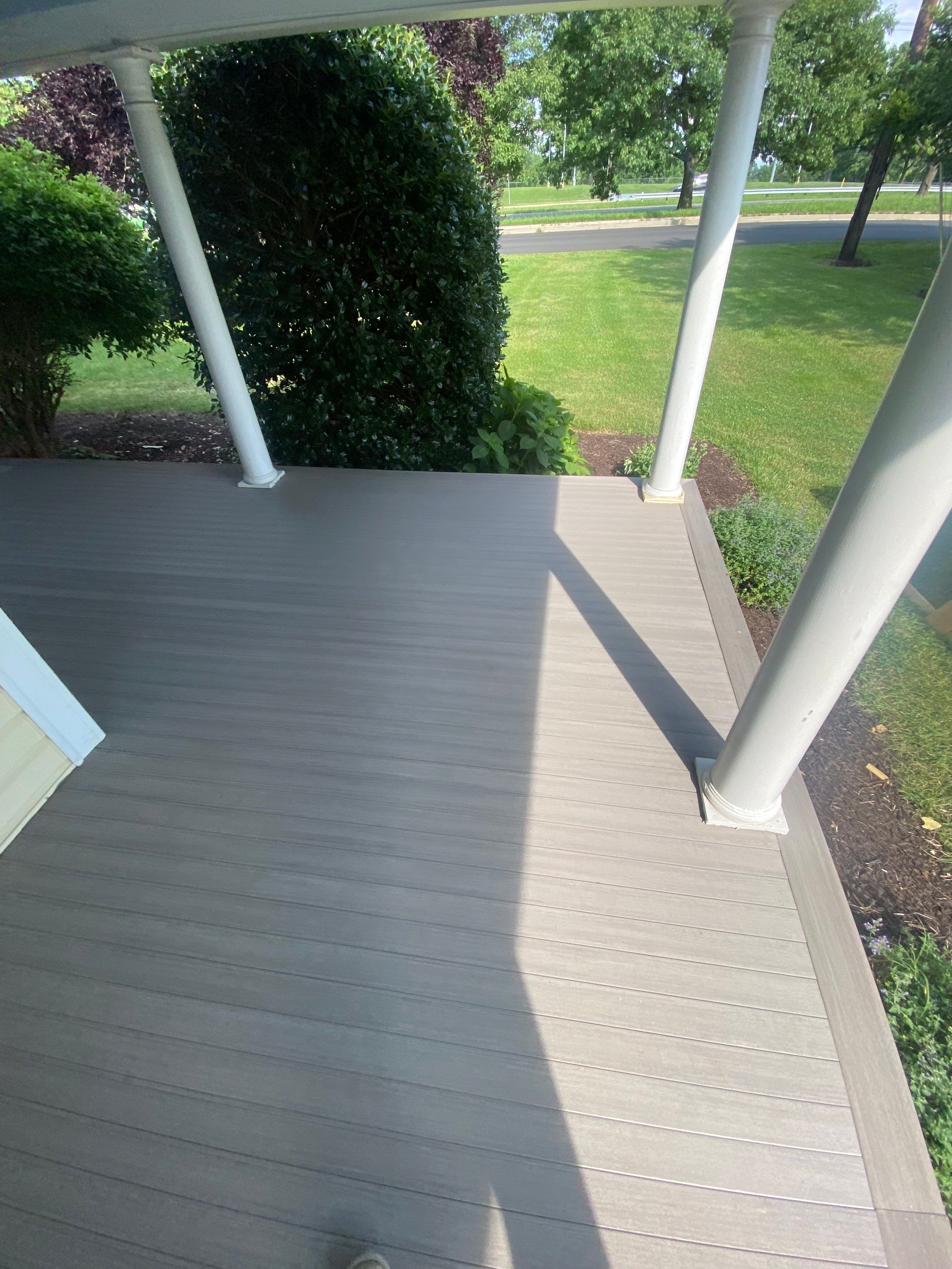 Front Porch Transformation using Timbertech Decking by The Smet Companies, LLC