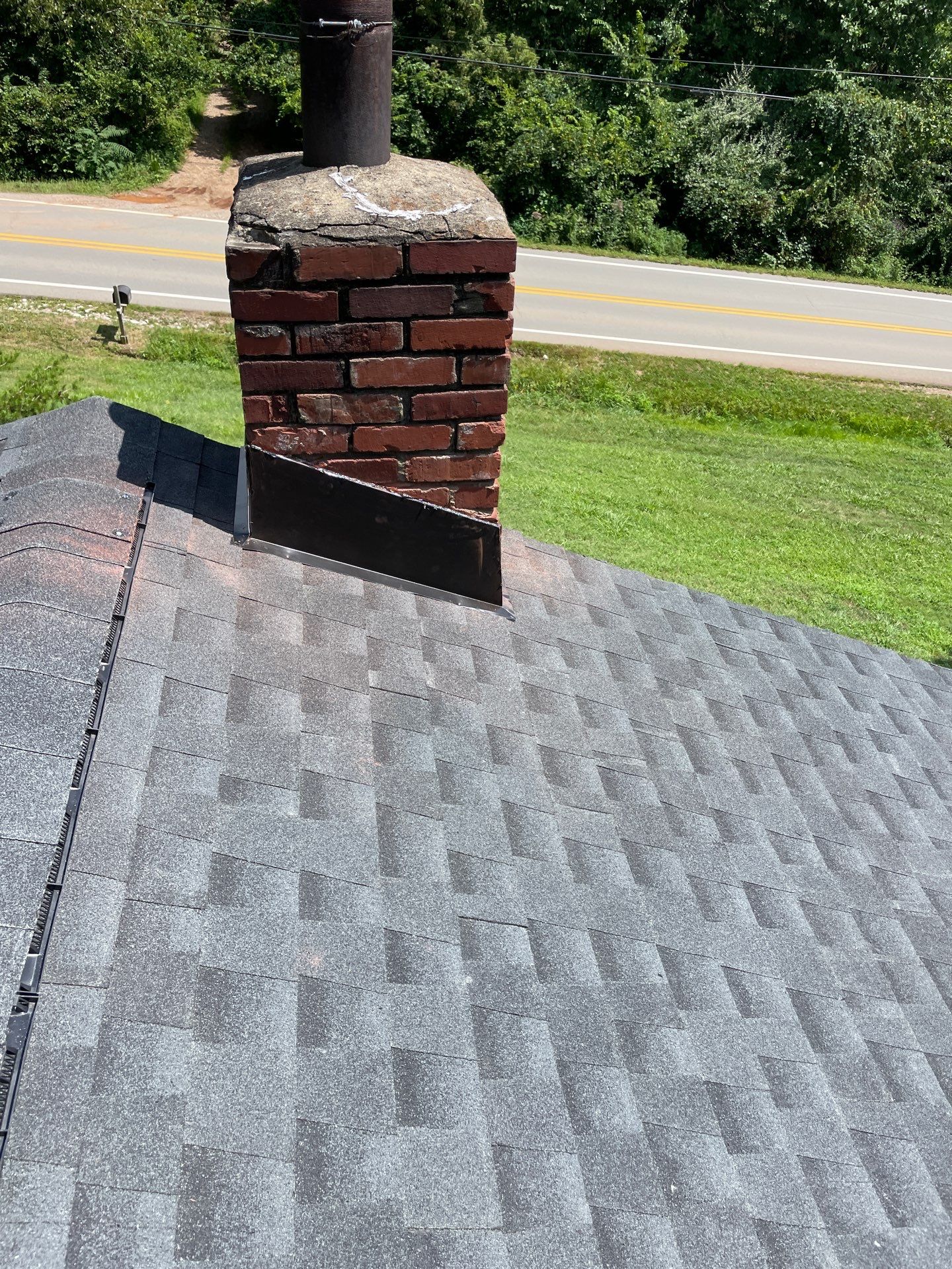 Residential Roofing Installation using GAF Timberline HDZ Charcoal by Rainstoppers Roofing