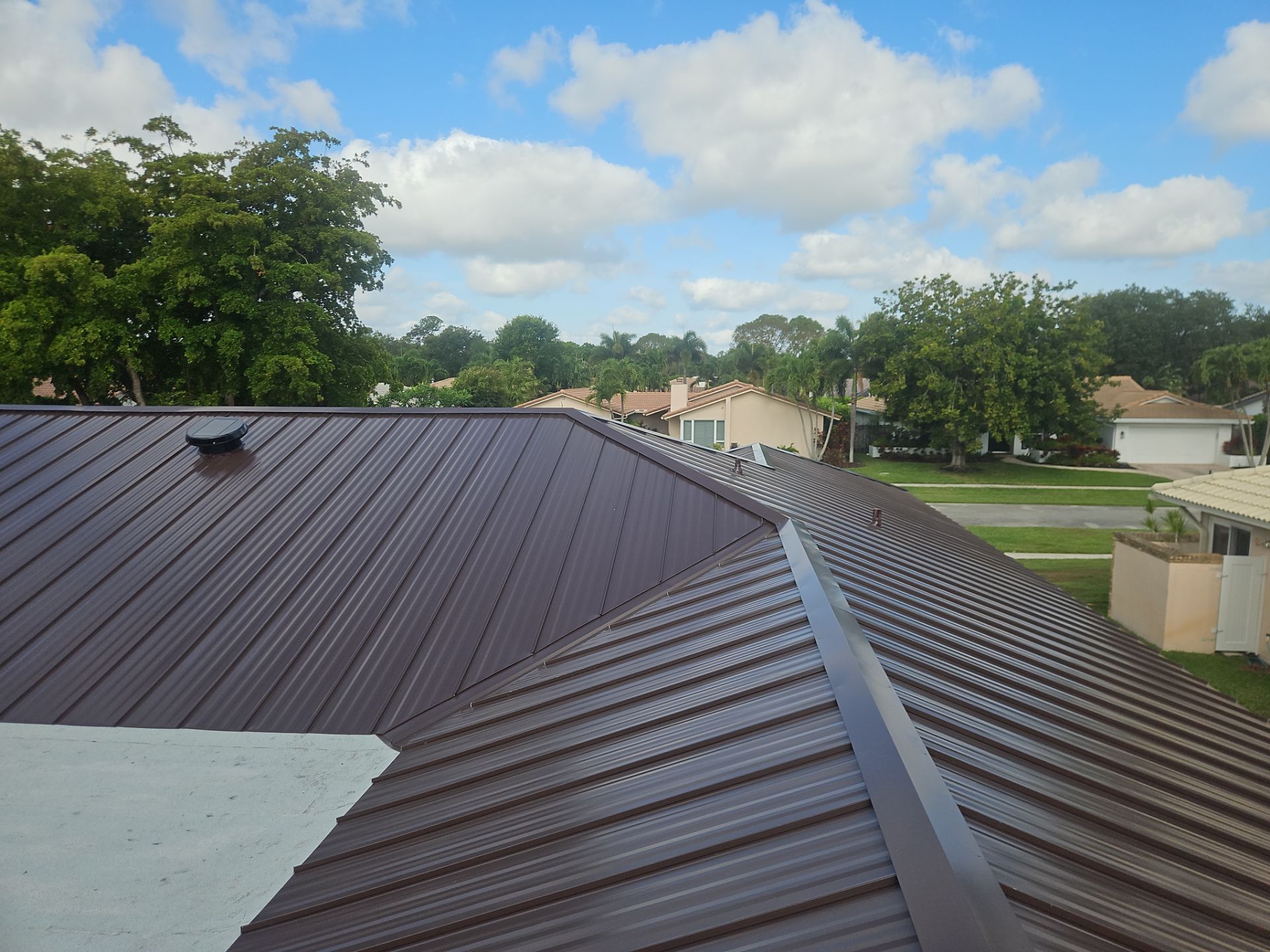 Residential Roofing Installation using 1" Nail strip metal roof by BLUES BROTHERS ROOFING