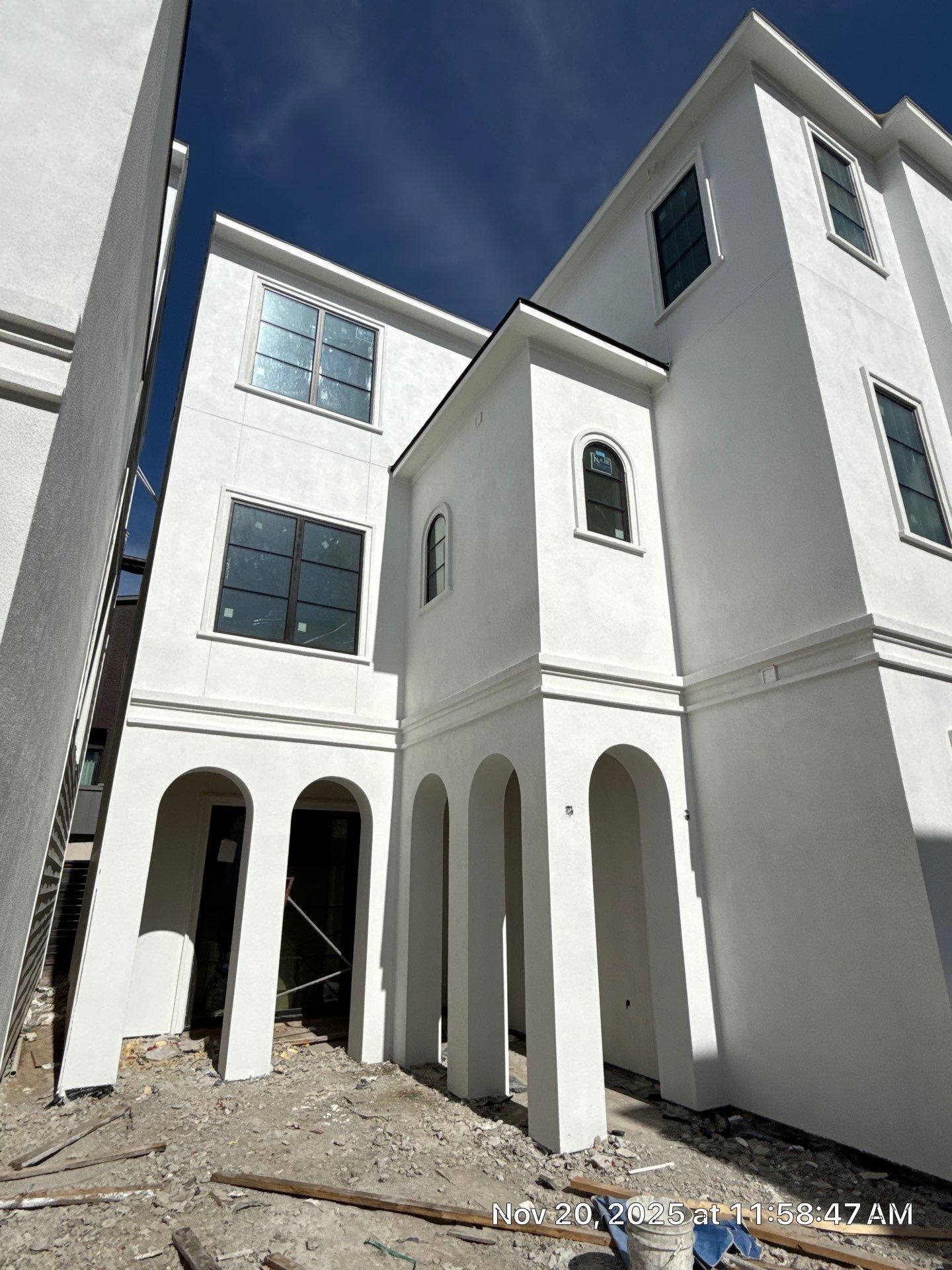 Modern Multi-Story Residential Stucco Home in Houston by Apex Conventional Stucco Llc