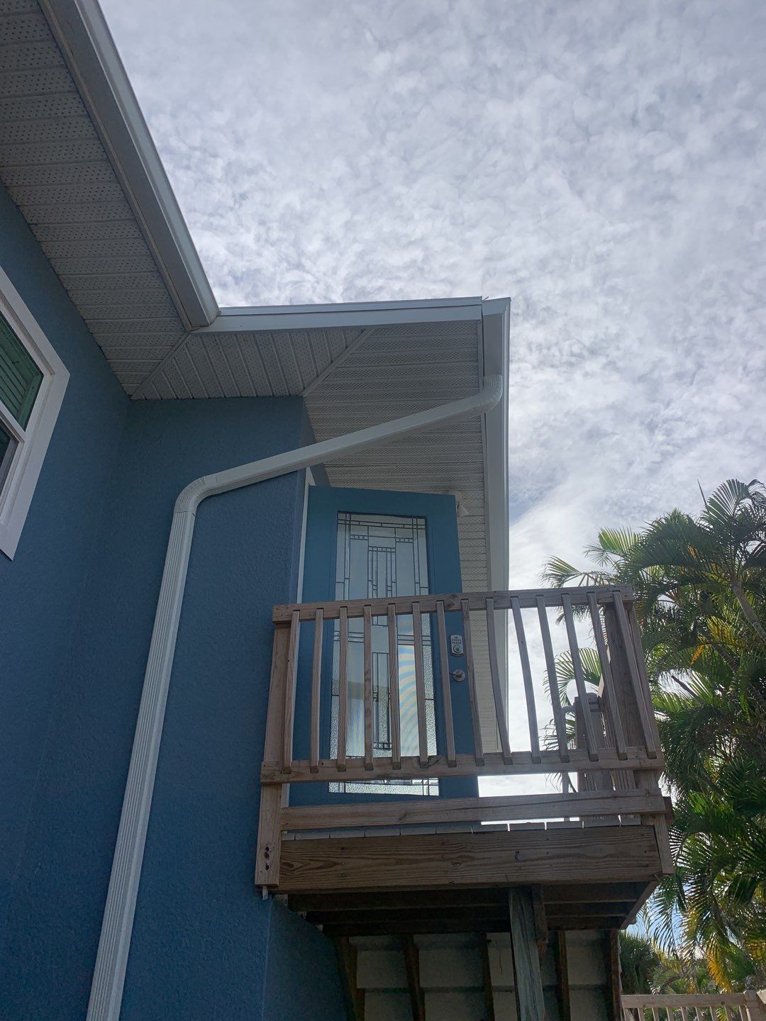 Downspout Installation for Two-Story Home in Fort Myers FL by Gutter Professor by Gutter Professors